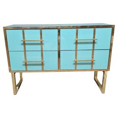 Luxe intemporel : Commode en verre de Murano et laiton d
azur d
Italie Disponible