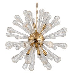 Lustre « Sputnik » composé de 50 verres bombés de Murano et d'une structure dorée