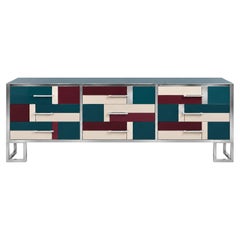 Geometric sideboard in petrol blue, burgundy, and ivory with nine drawers