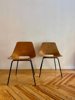 Set of six Pierre Guariche “Tonneau” chairs produced by Steiner in the 1950s