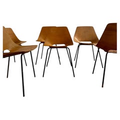 Set of six Pierre Guariche “Tonneau” chairs produced by Steiner in the 1950s