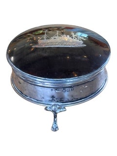 Round Metal Box with Inlaid Steamship Lid on Three Feet