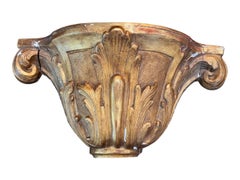 Consolle murale en bois doré sculpté