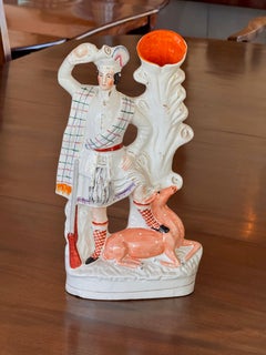 Staffordshire Figure of a Hunter with Deer