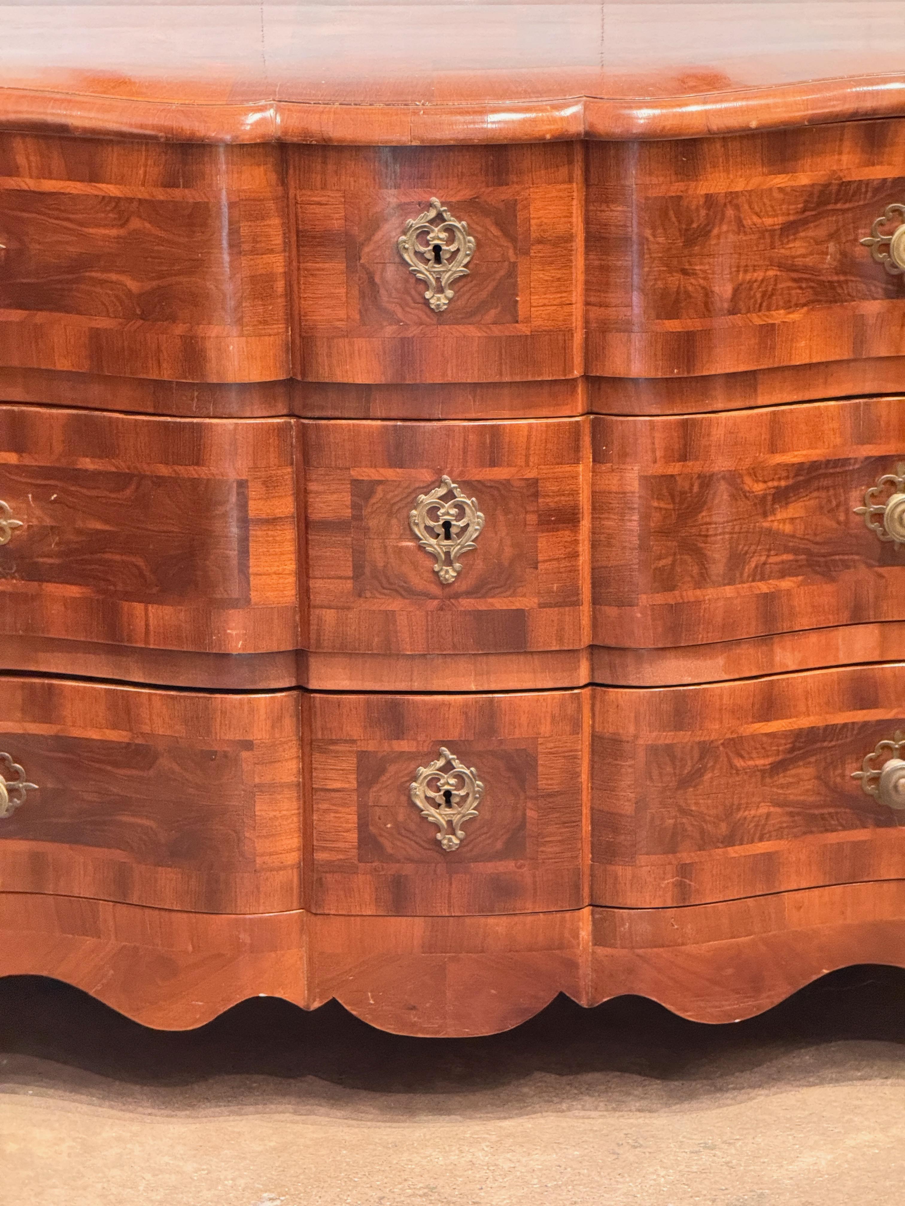Wood Continental Serpentine Chest With Inlaid Veneer For Sale