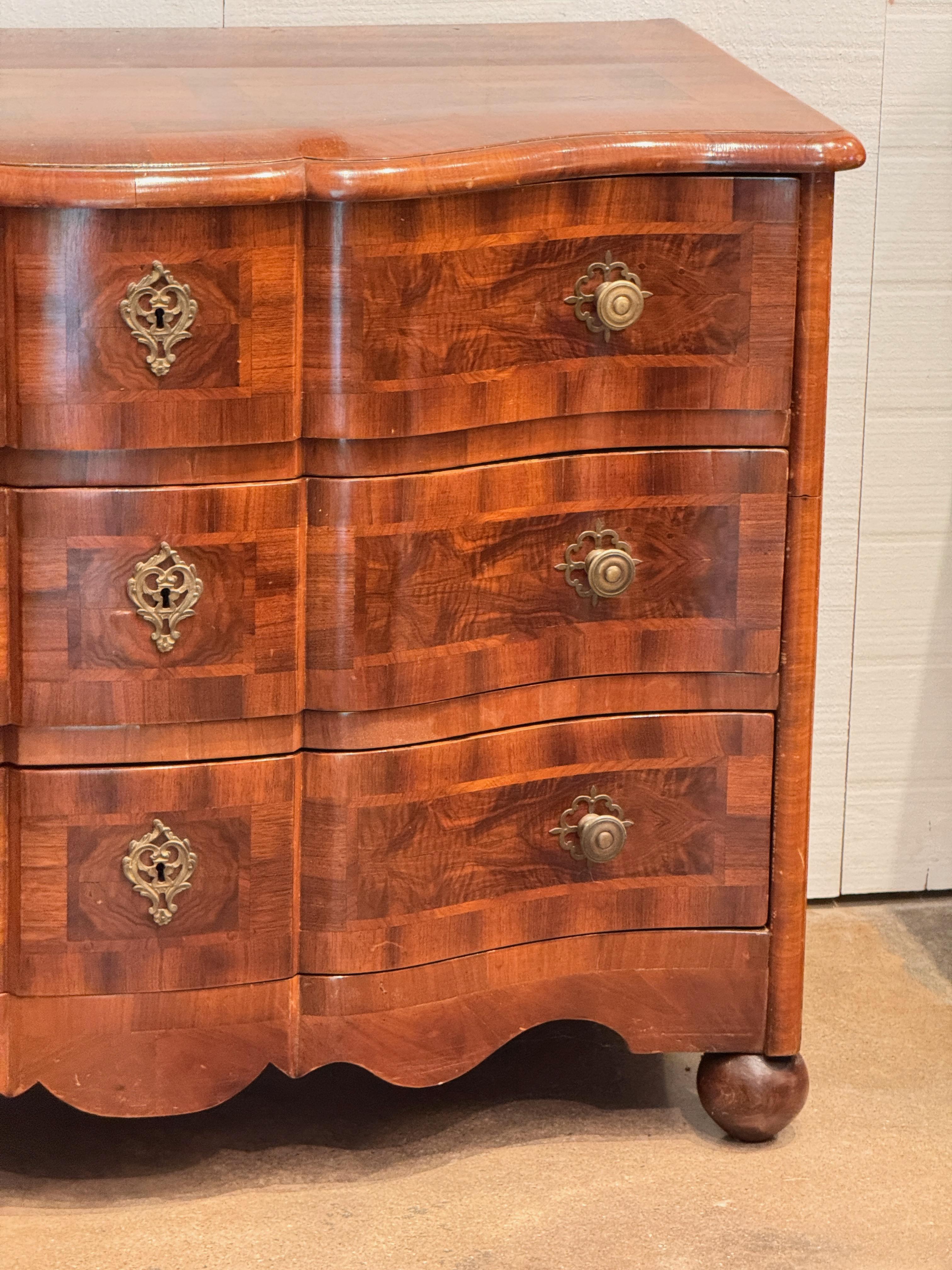 Danish Continental Serpentine Chest With Inlaid Veneer For Sale