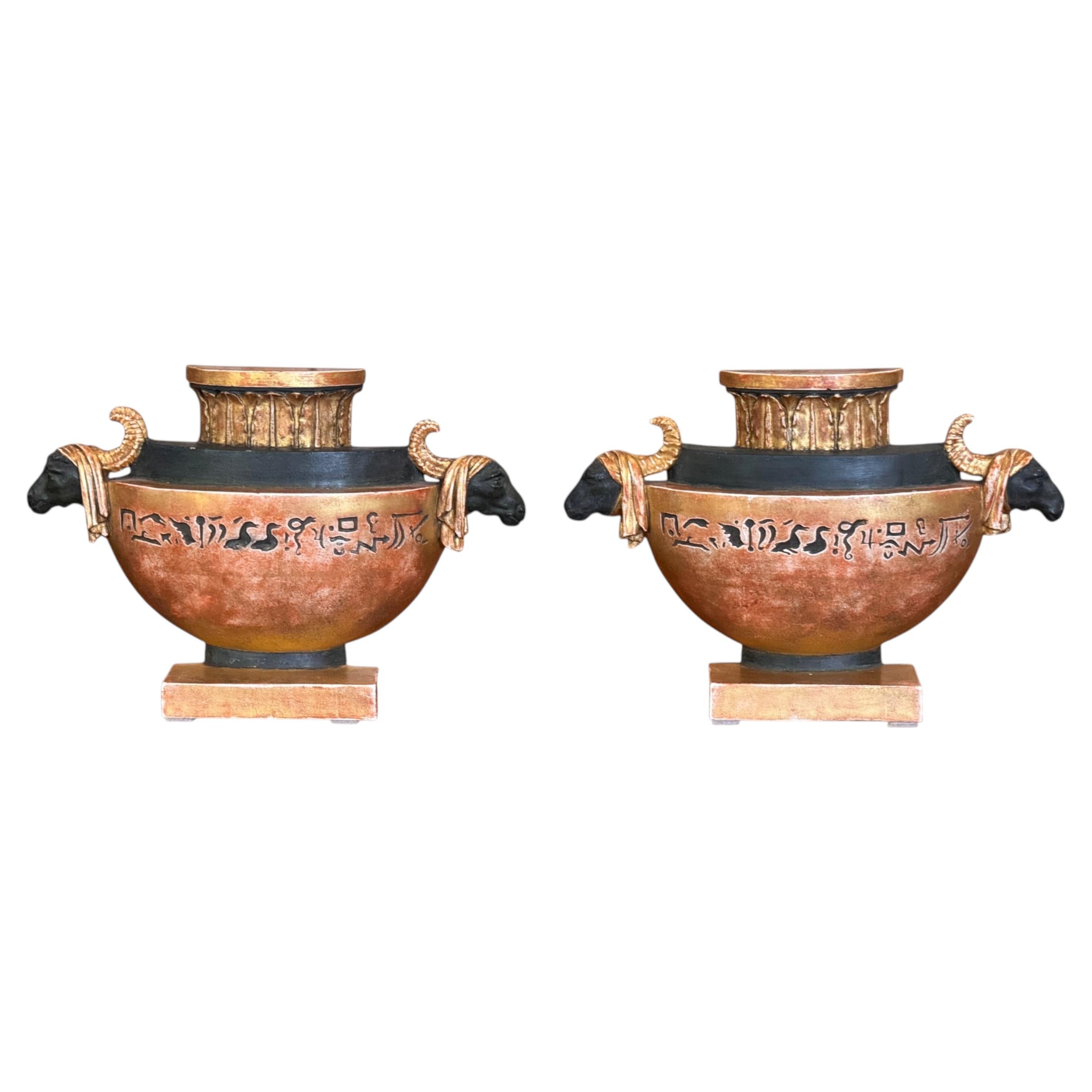 Pair of French Neoclassical Painted and Gilt Flatback Urns in the Egyptian Taste For Sale