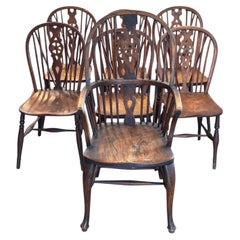 Set of Seven English Wheelback Windsor Chairs