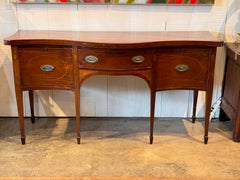 Serpentine English Mahogany Sideboard with Inlaid Shell Paterae