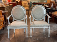 Pair of 19th Century Louis XVI Style Painted Oval-Back Fauteuils