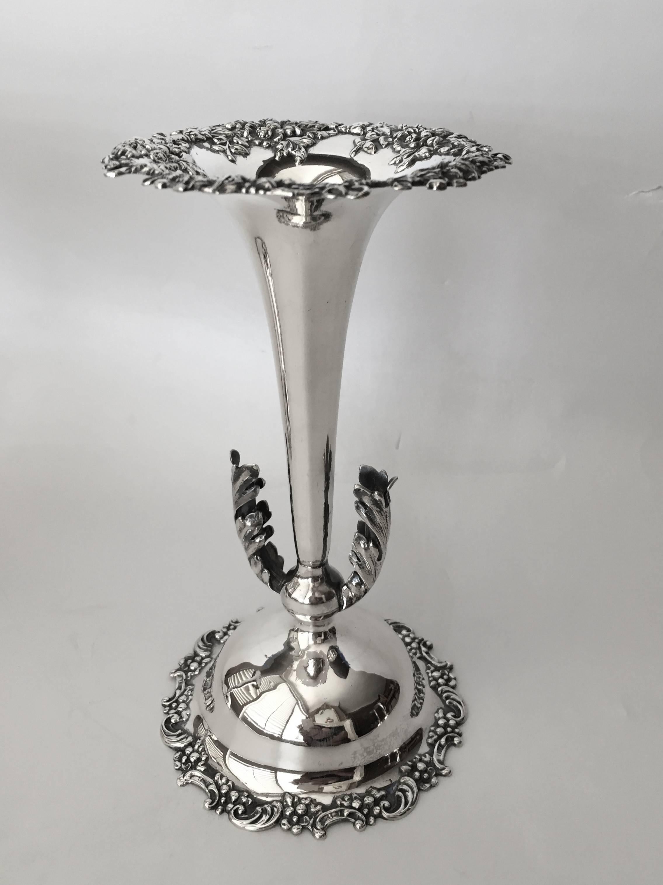 An extremely rare set of four sterling silver vases with side sections to contain single buds, wow, the design is fantastic and the work by the artisans at Mouser
always of the finest. Many techniques are shown off on these, reticulation, applied
