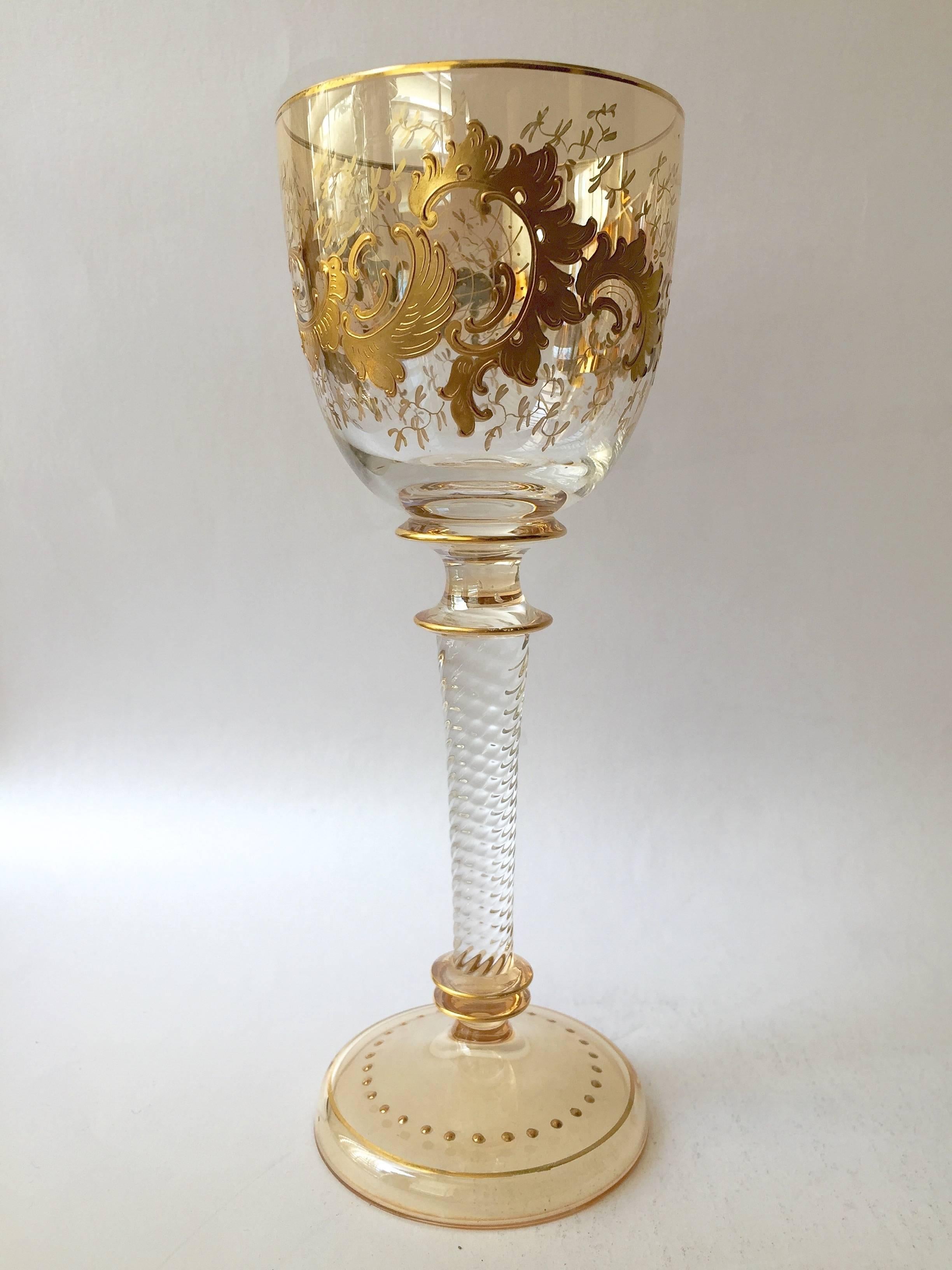 Over the top beautiful set of six Moser two color raised paste gilt wine stems
in fantastic condition, perfect for the holidays and gorgeous on display in a cabinet or bar while not in use. These are very rare the rich raise gold laid on heavily in