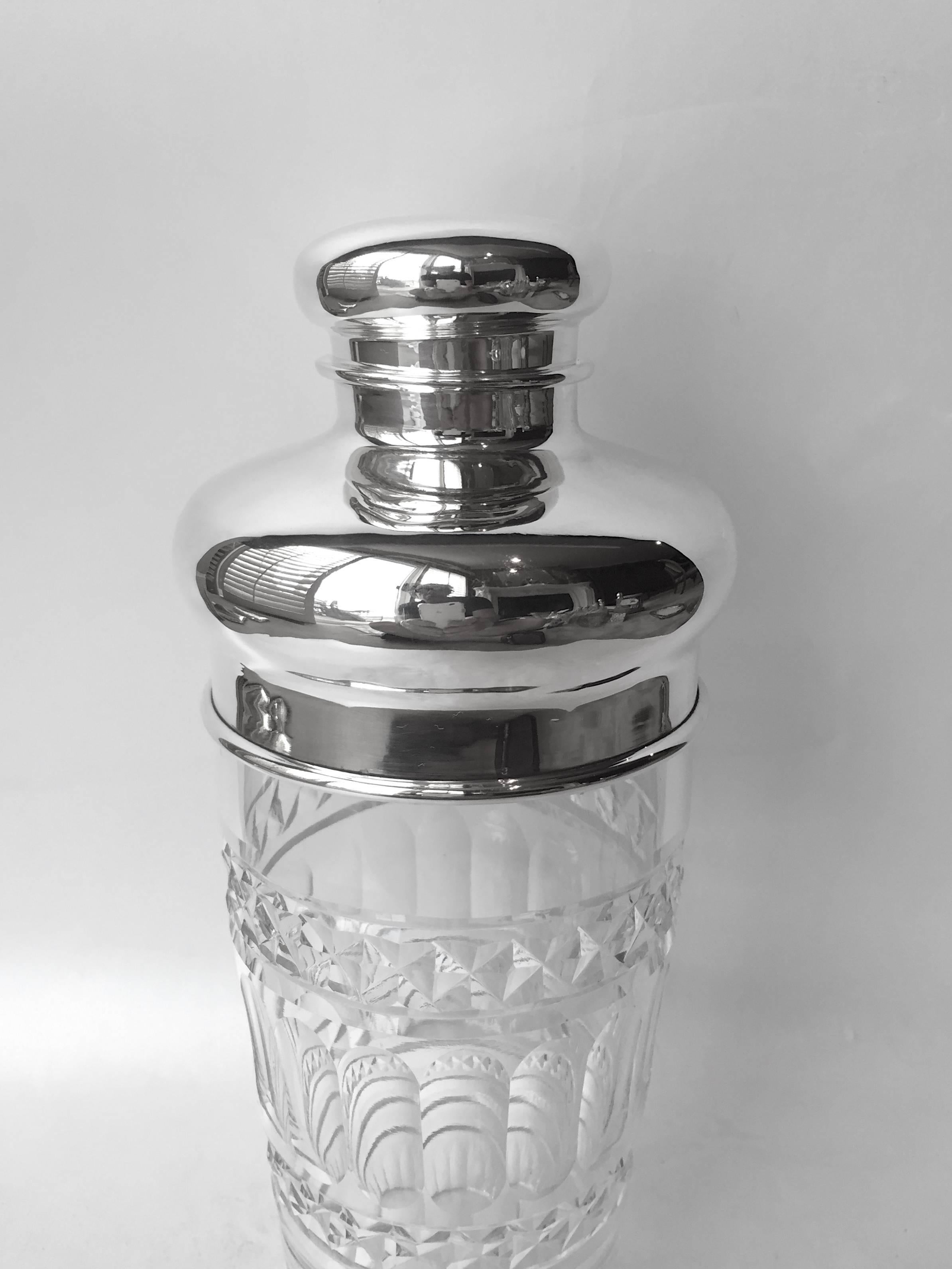 By Gorham Sterling and Hawkes cut-glass a very large and beautiful cocktail shaker you will be so proud to serve from and display in the bar area. Conservative in design but extremely classy. Made by two highly noted makers to be retailed at black