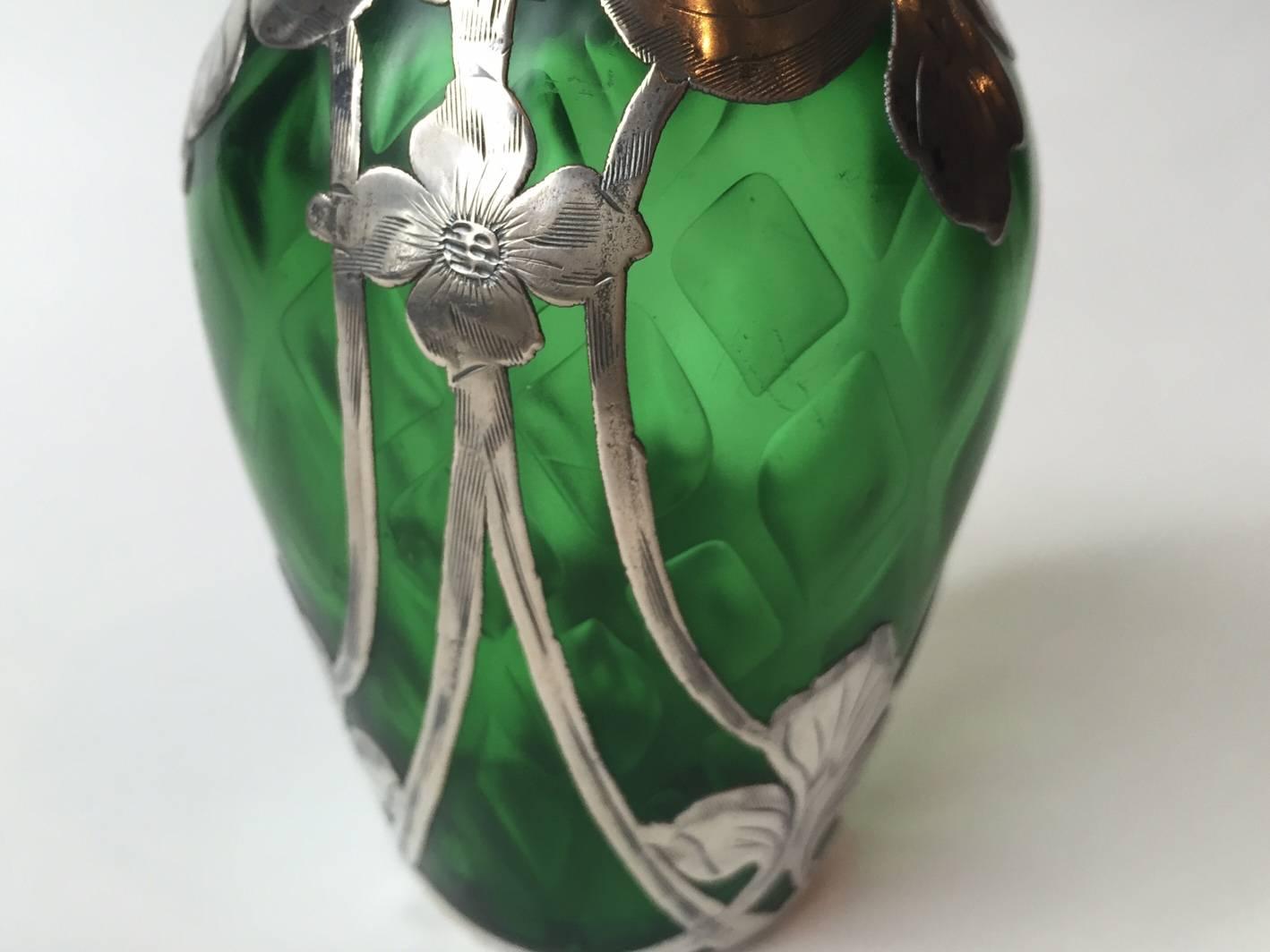 This vase the glass in the quilted pattern by Steuben and the silver overlay by Alvin is very rare and interesting it is always amazing to consider the question,
how the heck did they do that, well it a trapped air process and the control factor in