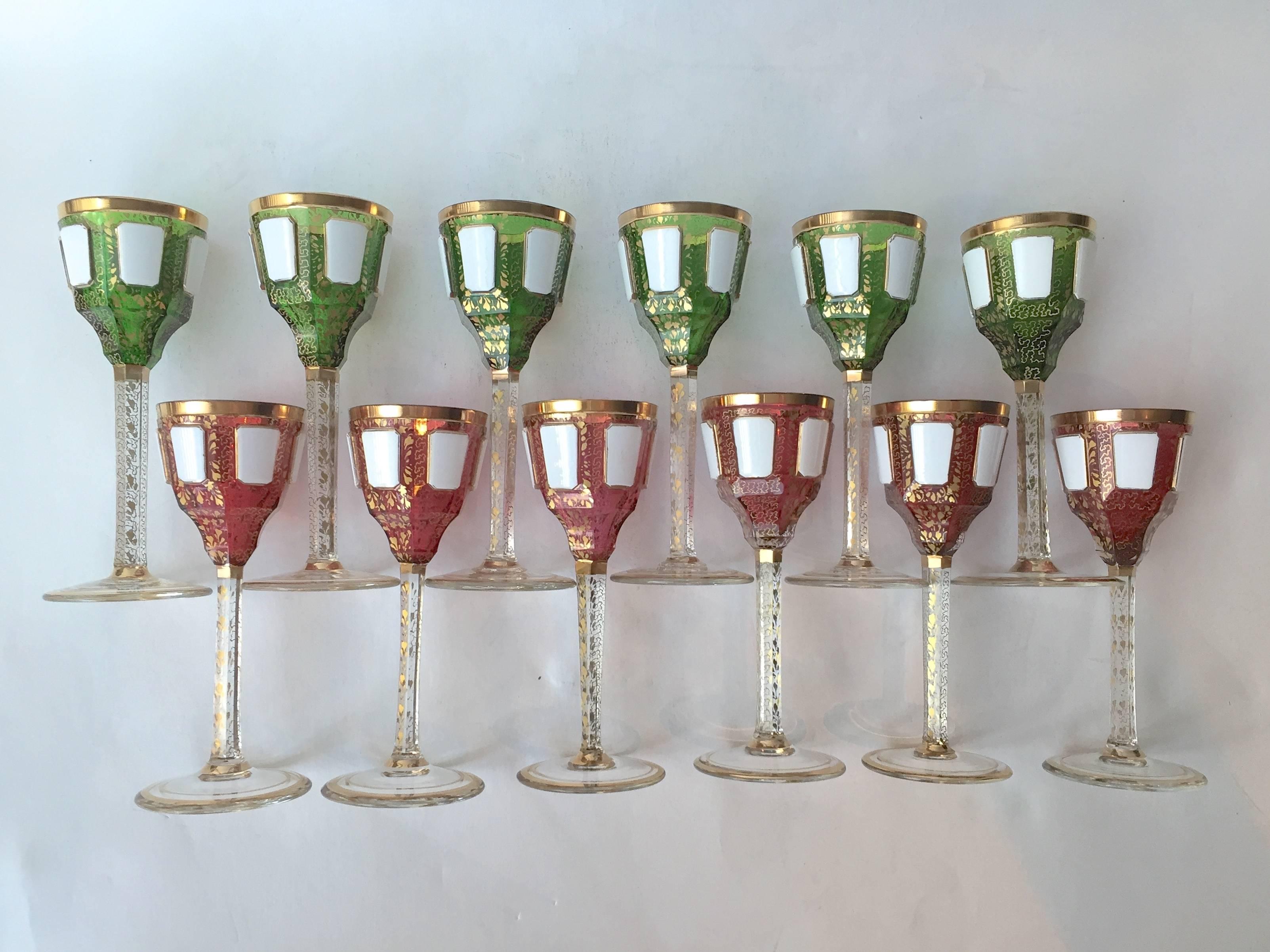 A very rare set of 12 Moser cordials two colors with enamel panels and
gilding, perfect condition.