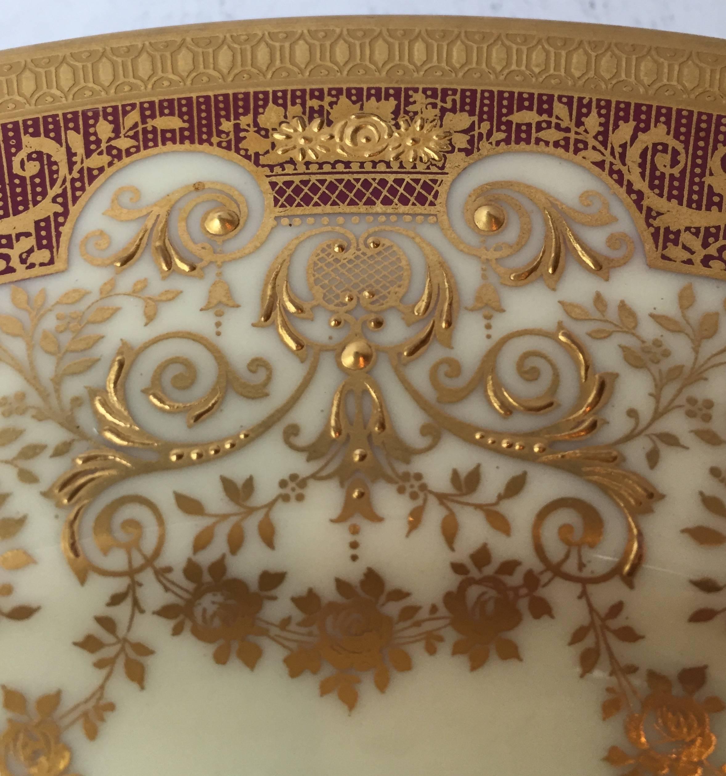 A rich beautiful design in highly raised paste gilding over an iridescent red
ground color some of the finest you will see. Great to have all 12 present and in remarkable condition. These would look fantastic on display while not in use,
perfect