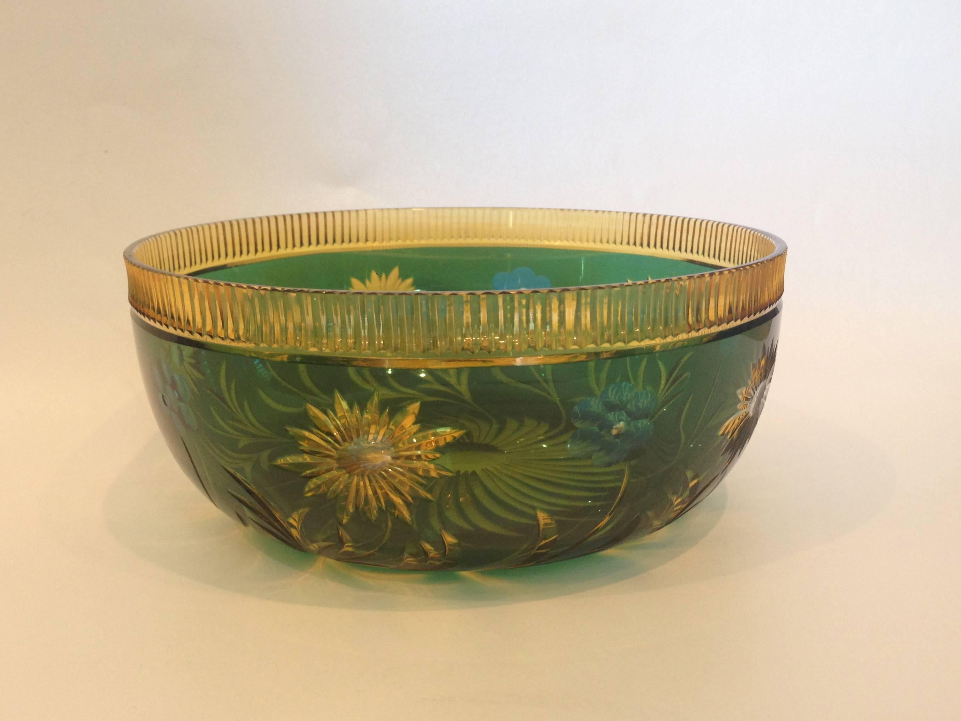 This beautiful bowl of four layers in colored glass is absolutely fantastic the overall color achieved with the combination is extremely rich, the bowl is cut. 
Even to the interior to isolate the clear for instance. I have never seen this exact