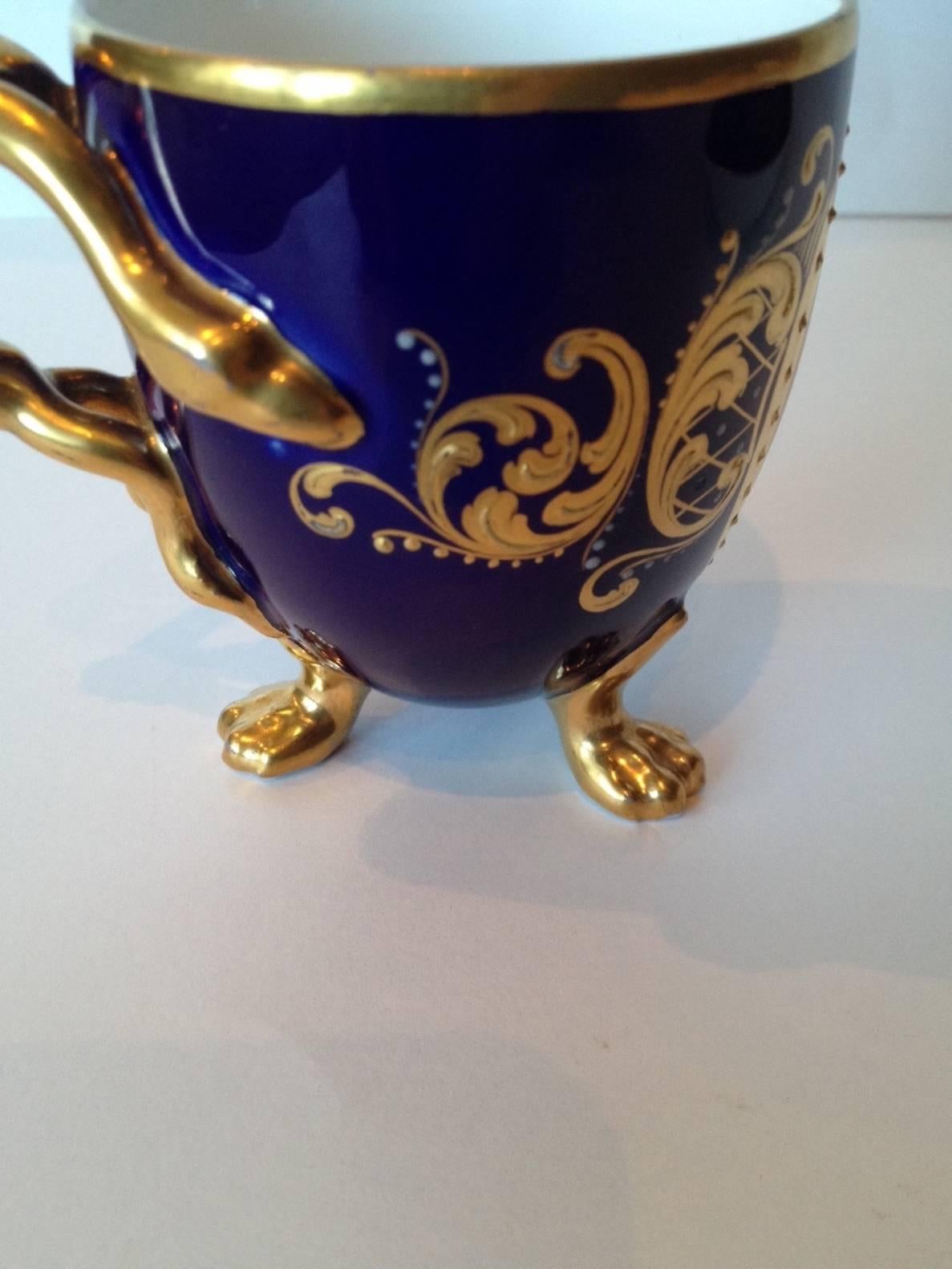 Gilt Vienna Cup and Saucer Twisted Snake Handle Paw Feet Egg Shape, 19th Century For Sale