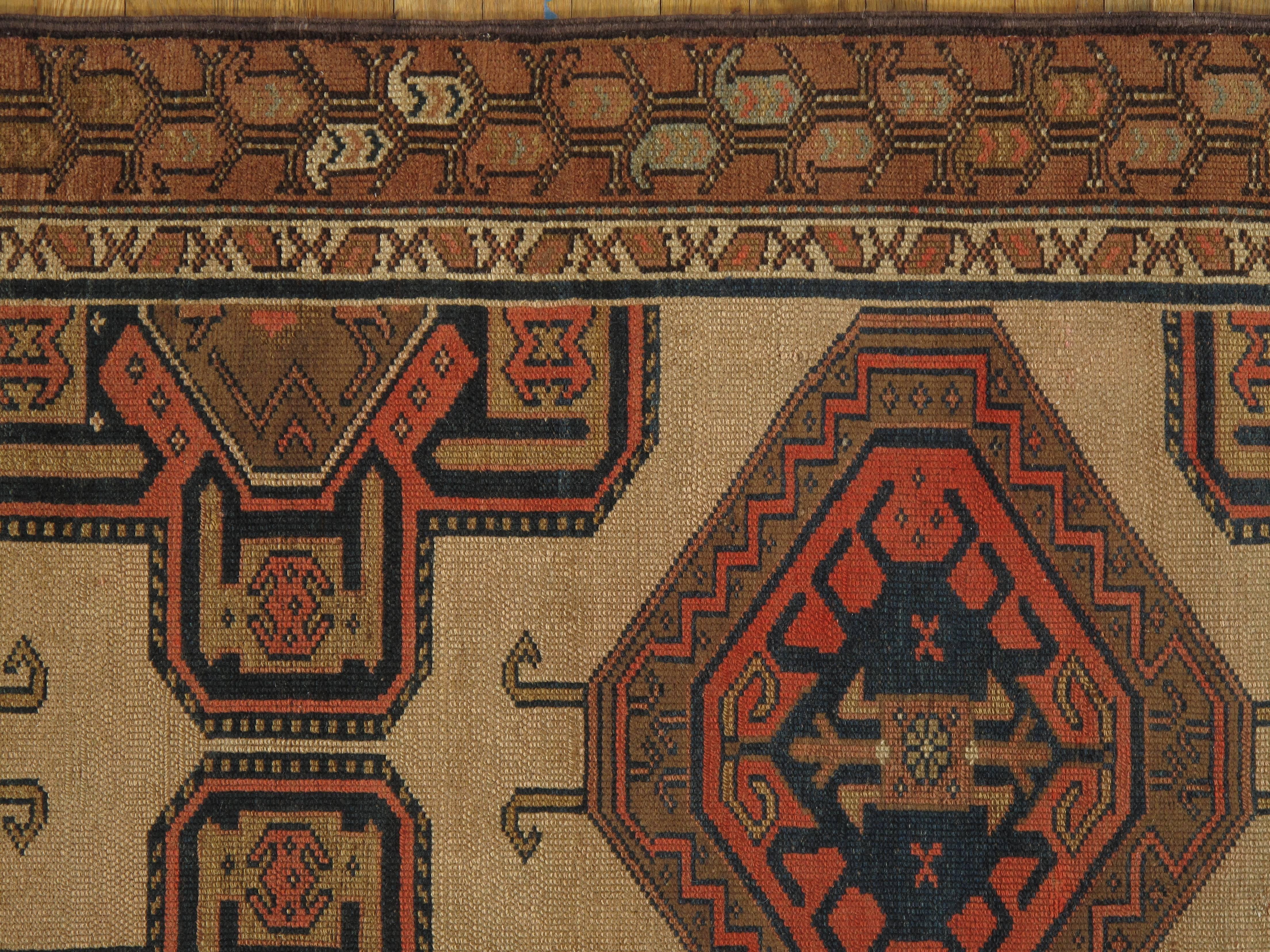 The village of Serab is known for their fine long runners with a characteristic camel ground and lozenge-shaped medallions. These rugs are woven in the village of Serab, located in the North West Region of Persia. Measures: 3'x15'2.
      
