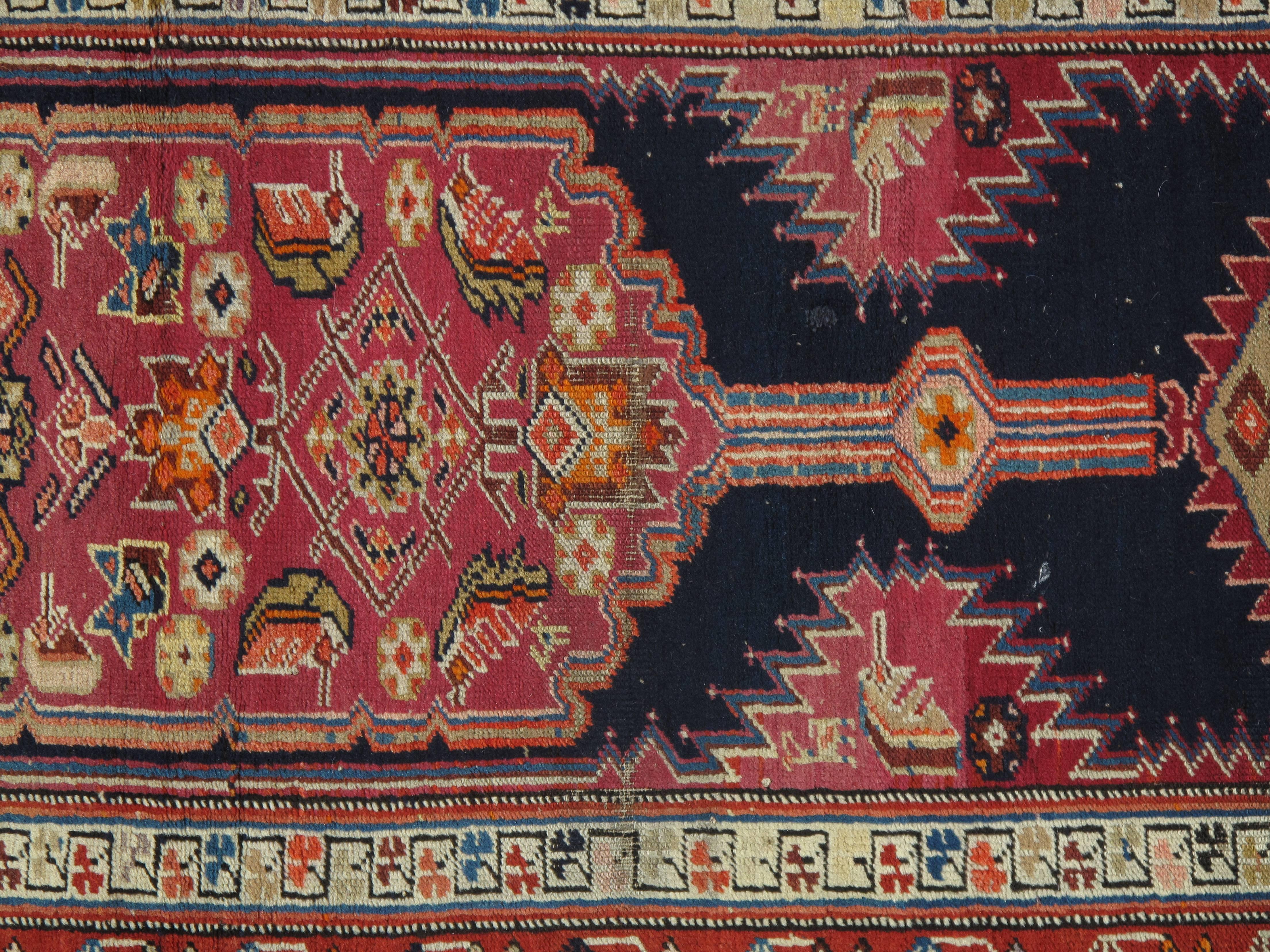 The Village of Serab is known for their fine long runners with a characteristic camel ground and lozenge-shaped medallions. These rugs are woven in the village of Serab, located in the North West Region of Persia.
Measures: 3' x 15'.