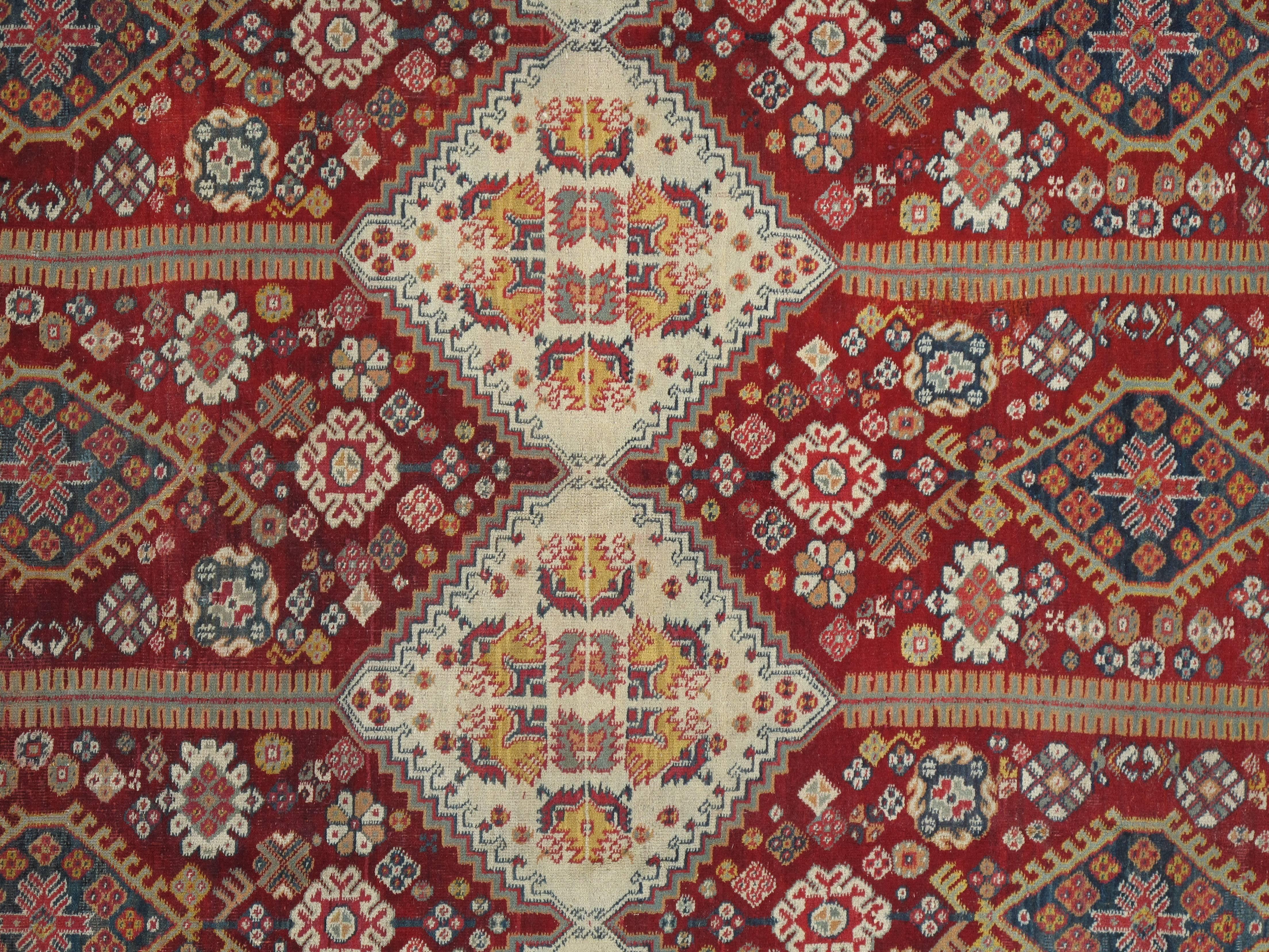 Agra rugs are the most highly sought after of any 19th century Indian rugs today. Agra rugs were extremely well-made heavy durable rugs and are considered the best of Indian rugs. This carpet is a late 20th century recreation.
Agra rugs are the