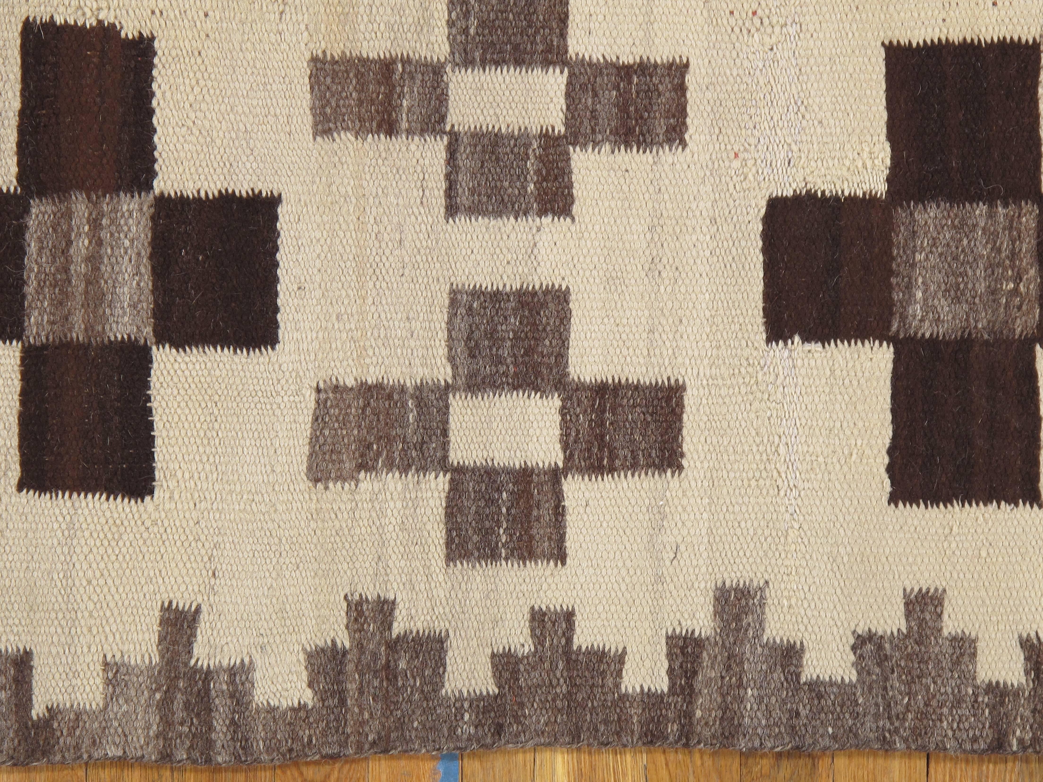 Navajo rugs and blankets are textiles produced by Navajo people of the Four Corners area of the United States, 2'x3'9". Navajo textiles are highly regarded and have been sought after as trade items for over 150 years. These rugs and blankets