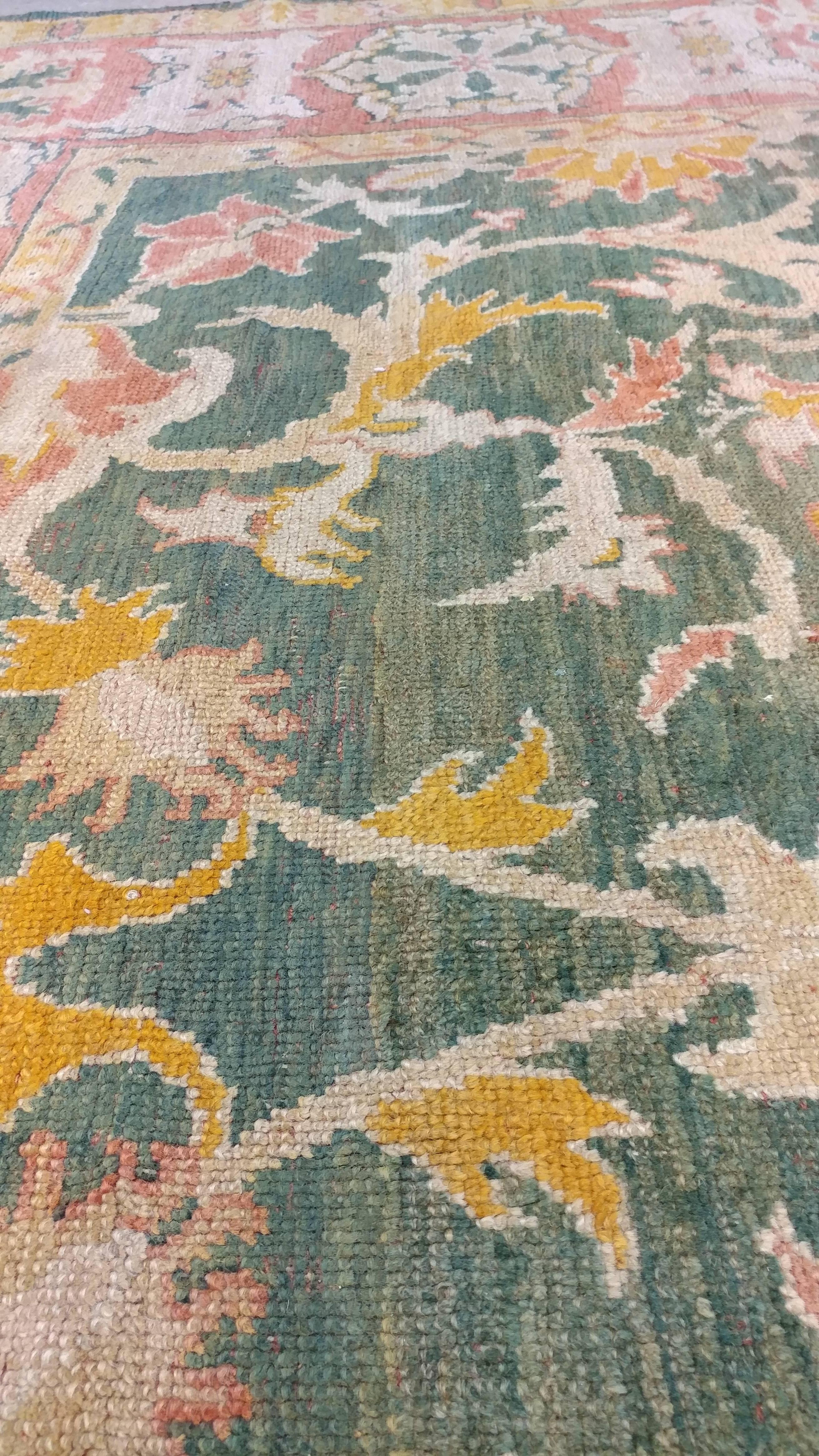 coral and green rug