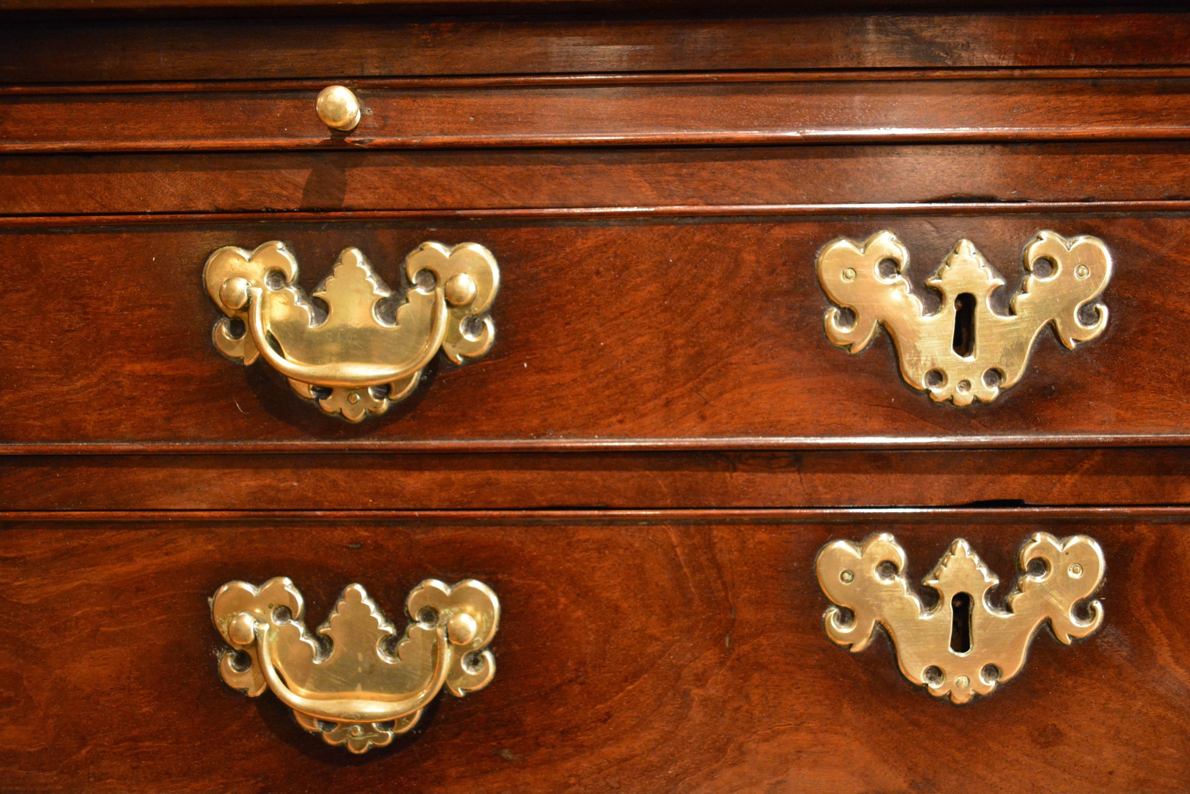 A small George II mahogany chest with brushing slide, retaining it's original brasses. The mahogany in this chest is particularly dense and heavy.
English Circa 1750
