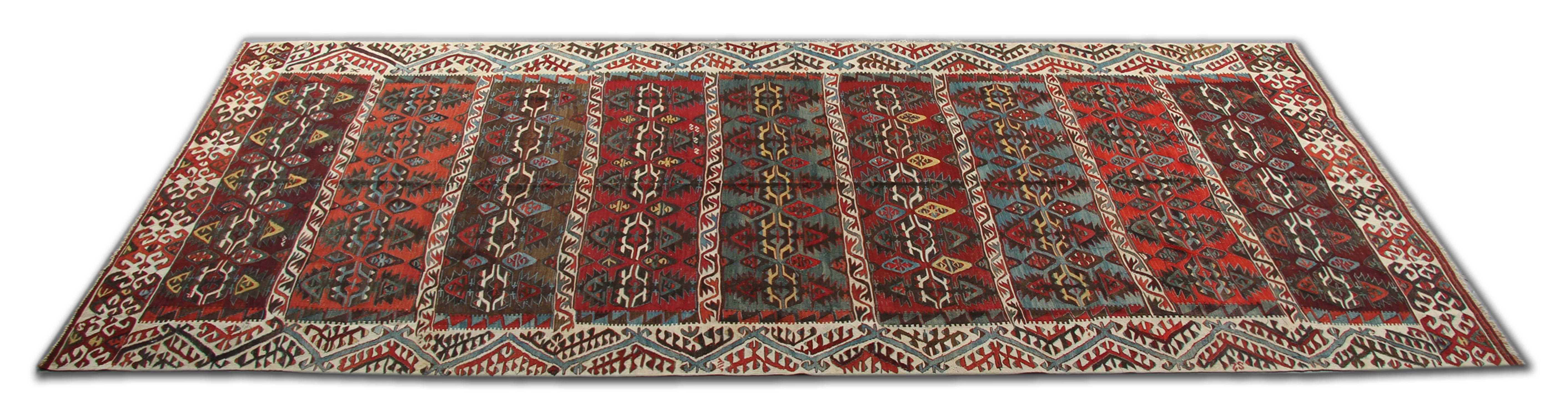 This handmade carpet Turkish rug is an antique rug traditional handwoven runner rug from Turkey. This carpet runner is suitable for stair runners and hallway rugs in a striking combination of bright red, shiny yellow, navy, light blue, sea blue,