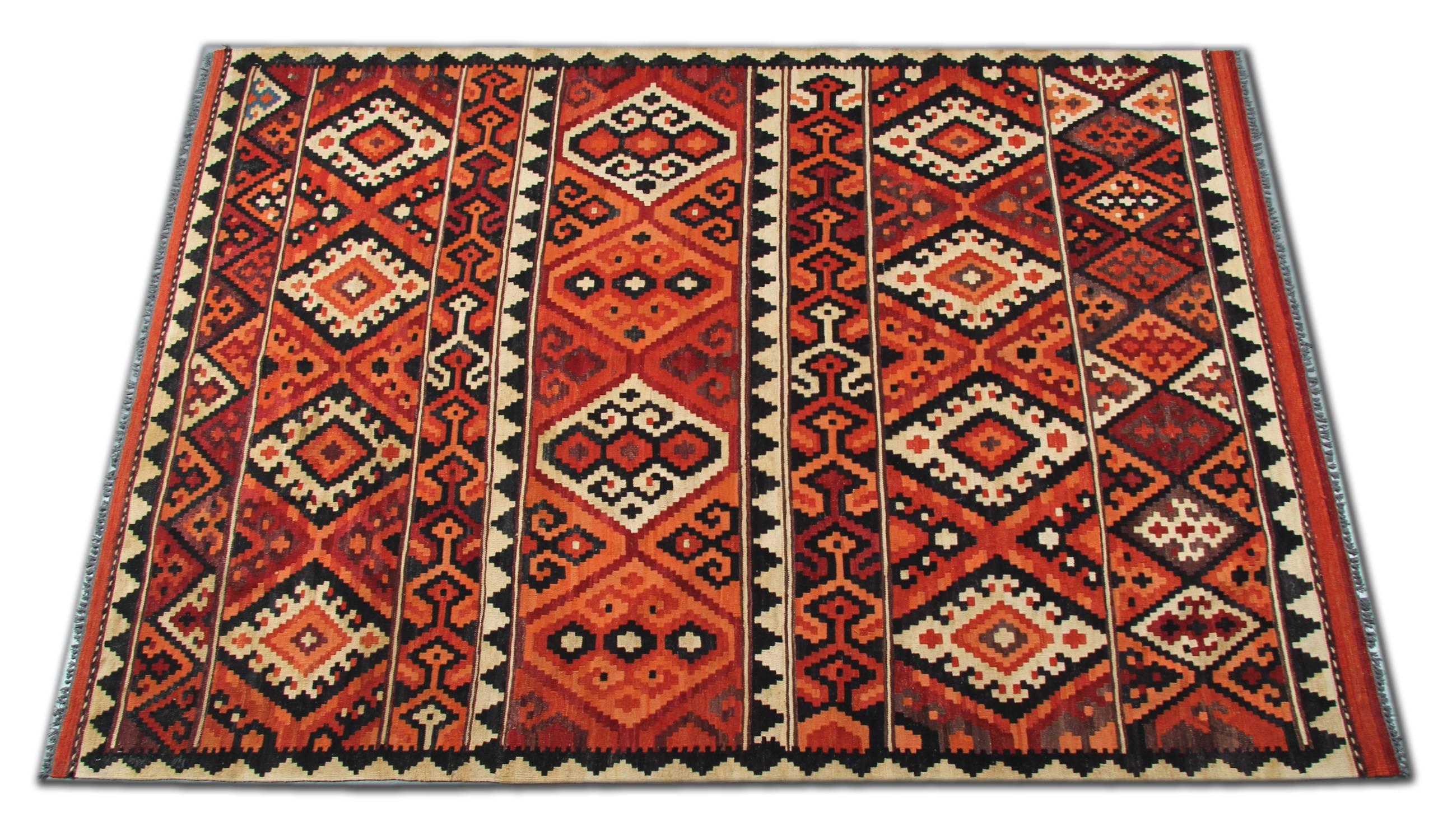These tribal kilims  are handmade rugs in Afghanistan. These high quality rugs are made of the finest wool and cotton. For the production of these wool rugs, the rug dyes are completely organic. The geometric rug design is traditional and the woven
