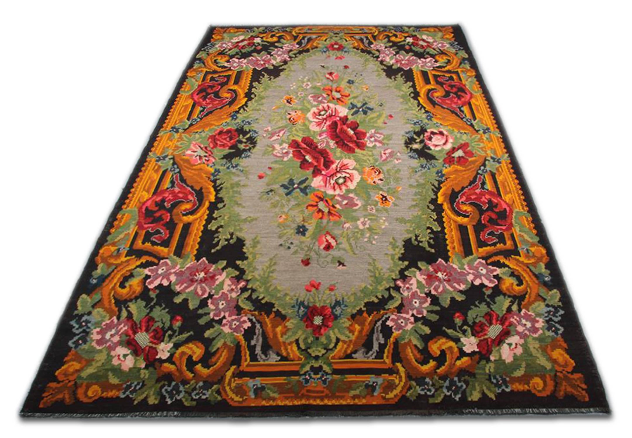 This vintage Moldovian Kilim is from Romania, handwoven in, circa the 1920s which has used unusual colour combinations.
This colourful carpet rug is woven by very skilled weavers in Moldovia, who used the highest quality wool and cotton. The