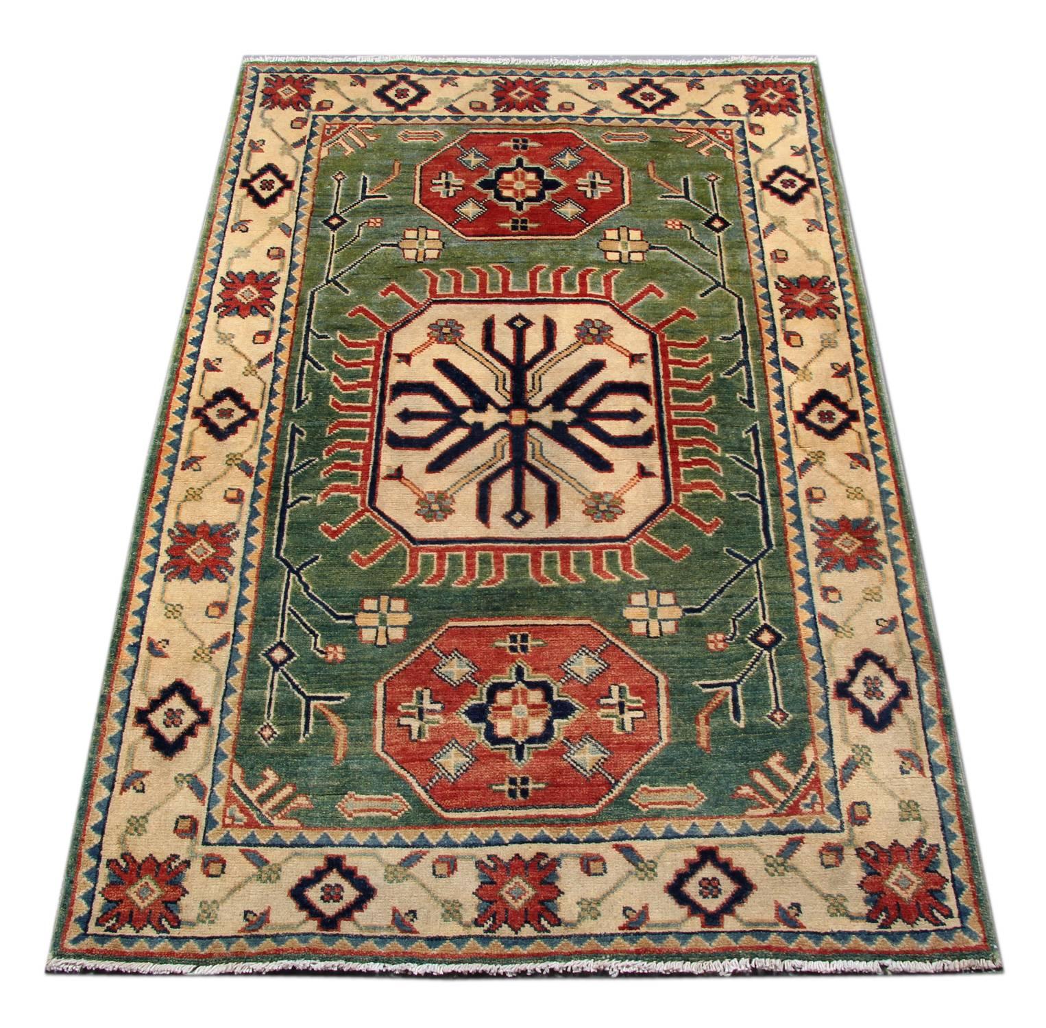 The exquisitely new Kazak woven rug is made by hand using both cotton and wool. The design depicts traditional geometric rug patterns which include flowers and central medallions. That design of these handmade rugs have been influenced by the