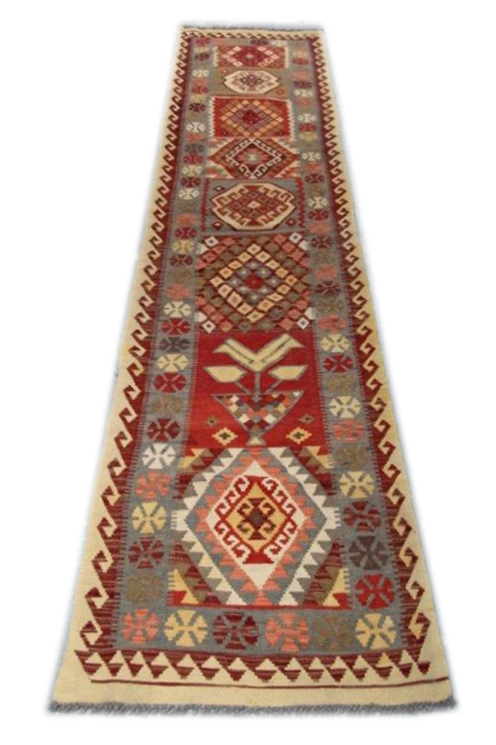 This geometric runner rug has been handmade in Afghanistan by Uzbek and Turkman tribes by using high-quality wool and cotton. Also, the dyes are organic. The geometric designs are inspired by the Persian Qashqai tribe and are multicolored.