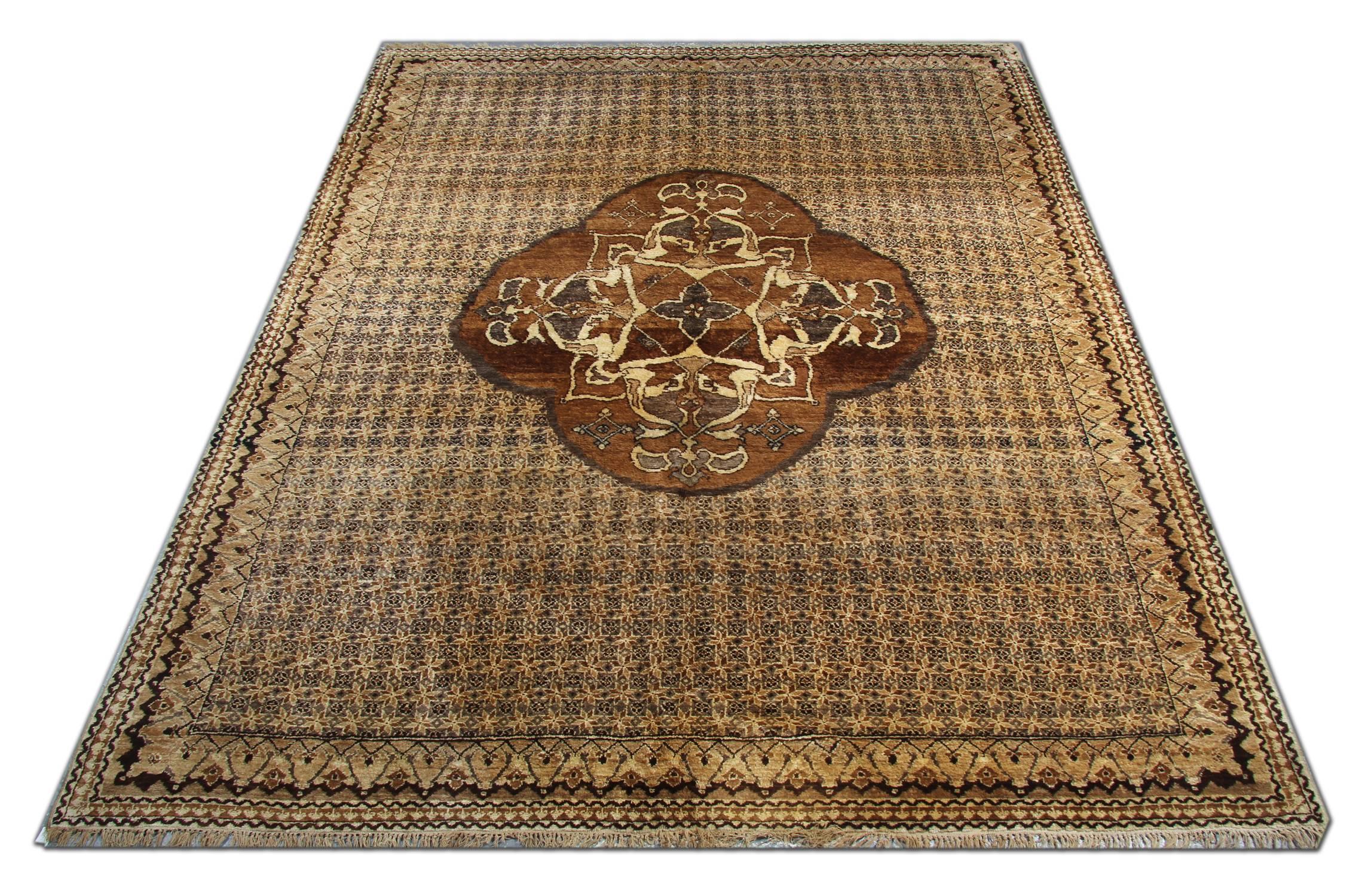 This handmade carpet antique rug is a Turkish brown rug with central medallion and lights brown background colour. These luxury rugs would complement your home as floor rugs. These large rugs look beautiful and would stand out as living room rugs
