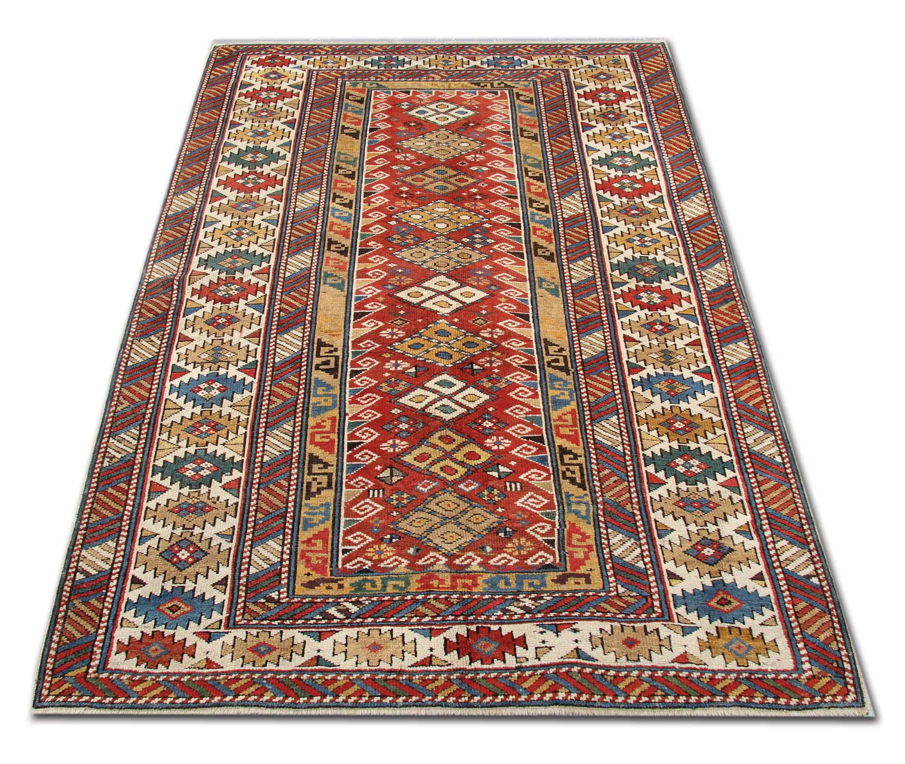 An excellent example of Caucasian handmade carpet rug weaving from the Shirvan region. Though these orange-red ground Central Medallion patterned rugs may seem like from a distance, but this woven rug has a great range of colours. This geometric rug