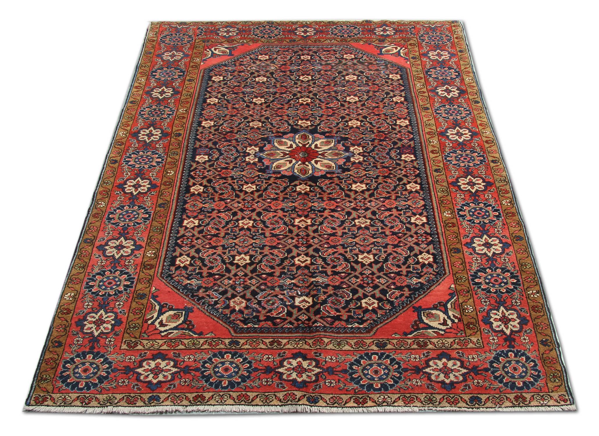 This is a Persian Bakhtiar woven in the late 1890s. A very decorative piece with subduing colors and great geometry of central medallion design. It is in excellent condition, nice even low pile and no repairs.