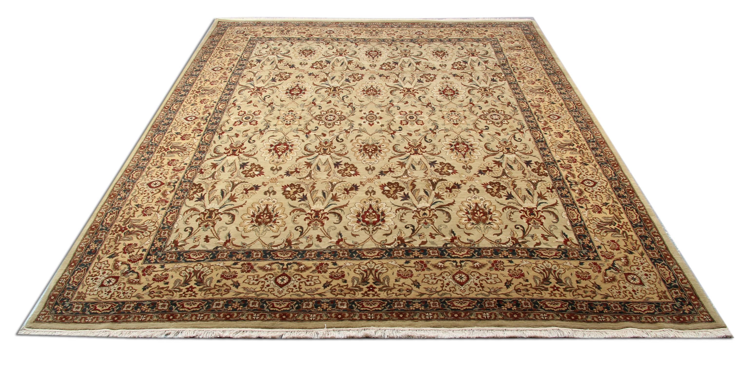This fine wool area rug has been woven by hand and features a fantastic floral design through the centre. The design features a repeat all over pattern and a highly-decorative repeat pattern border. The design and colour in this piece make it the