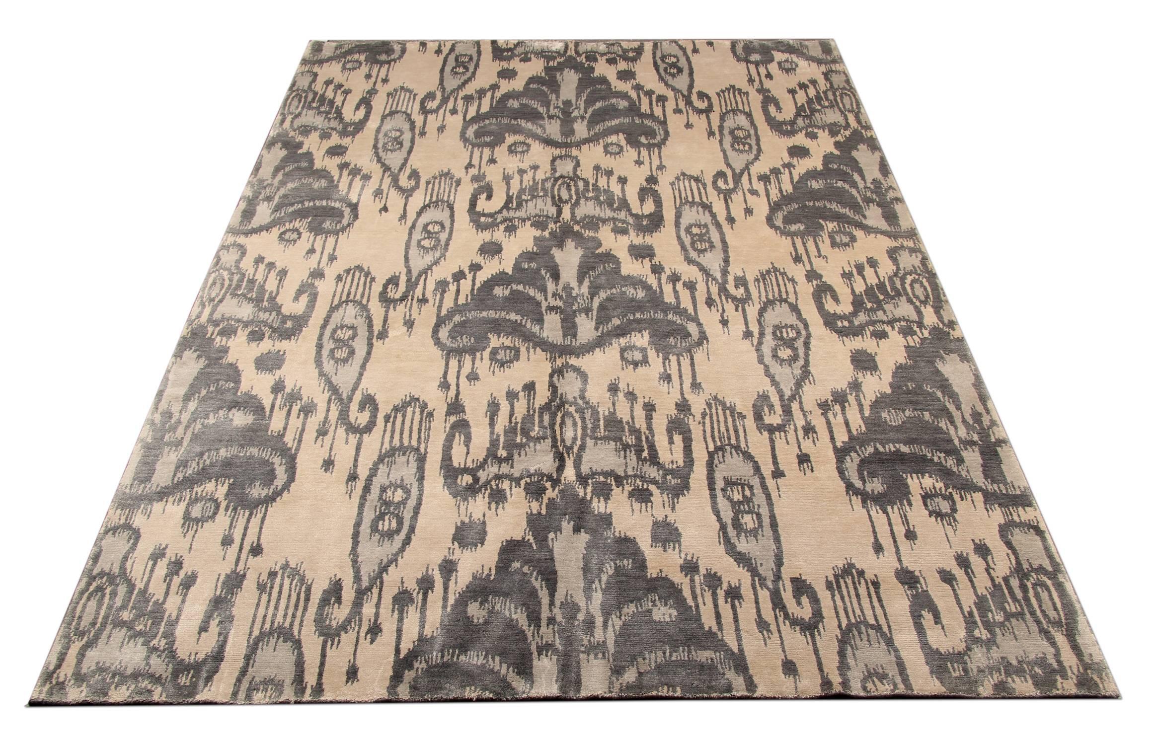 This handmade carpet oriental rug transitional grey rug has an inherently sophisticated quality and a floral rug design. These luxury rugs are adding texture to monochromatic interiors and these handwoven rugs are keeping the overall design scheme