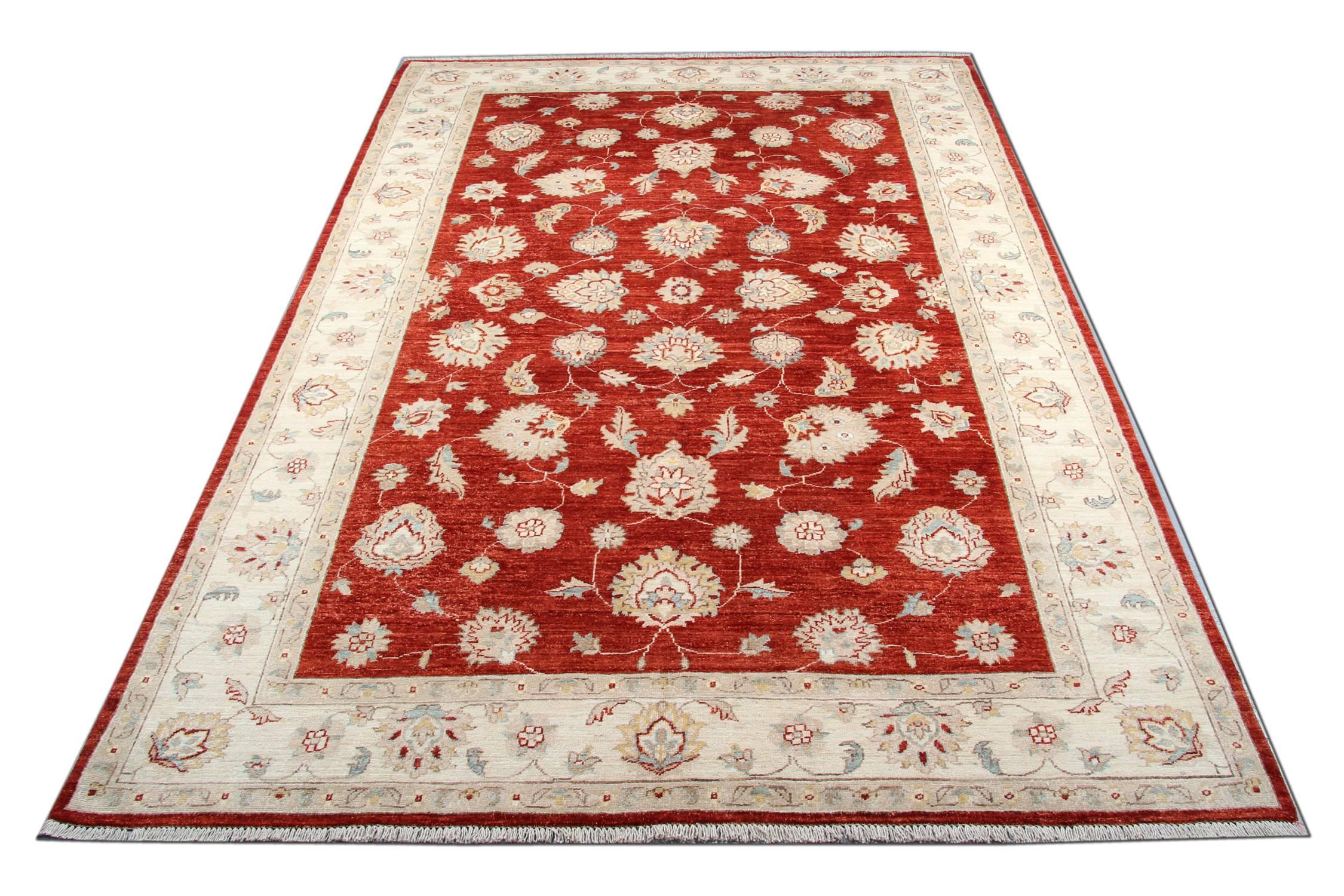 This woven rug is a Ziegler Sultanabad carpet rug made on our looms by our master weavers in Afghanistan. These handmade rugs have been made with all natural veg dyes and hand spun wool. The large-scale design makes Sultanabad wool rugs regarded as