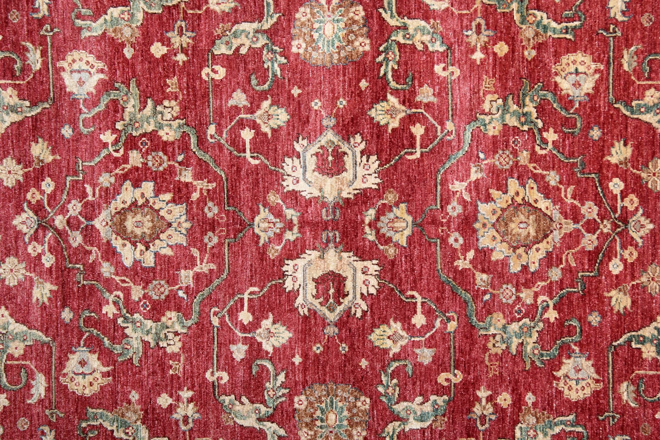 This magnificent mature red rug is a Ziegler Sultanabad woven rug made on our looms by our master weavers in Afghanistan. The carpet rug is handmade with all natural veg dyes and all handspun wool. The large-scale floral rug design makes Sultanabad