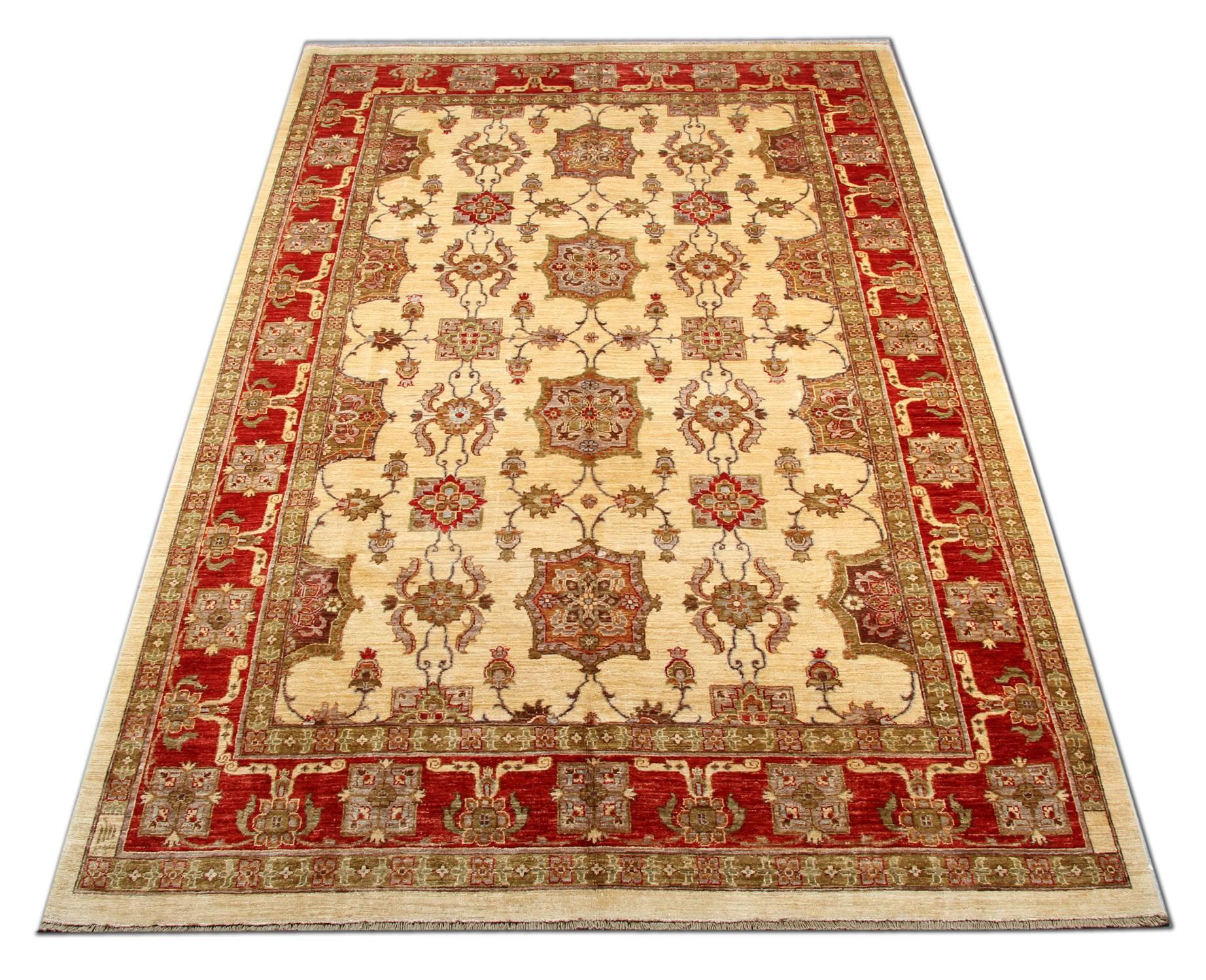 This magnificent gold rug is a Ziegler Sultanabad Handwoven rug made on our looms by our master weavers in Afghanistan. The carpet Oriental rug is handmade with all-natural veg dyes and all handspun wool. The large-scale floral rug design makes