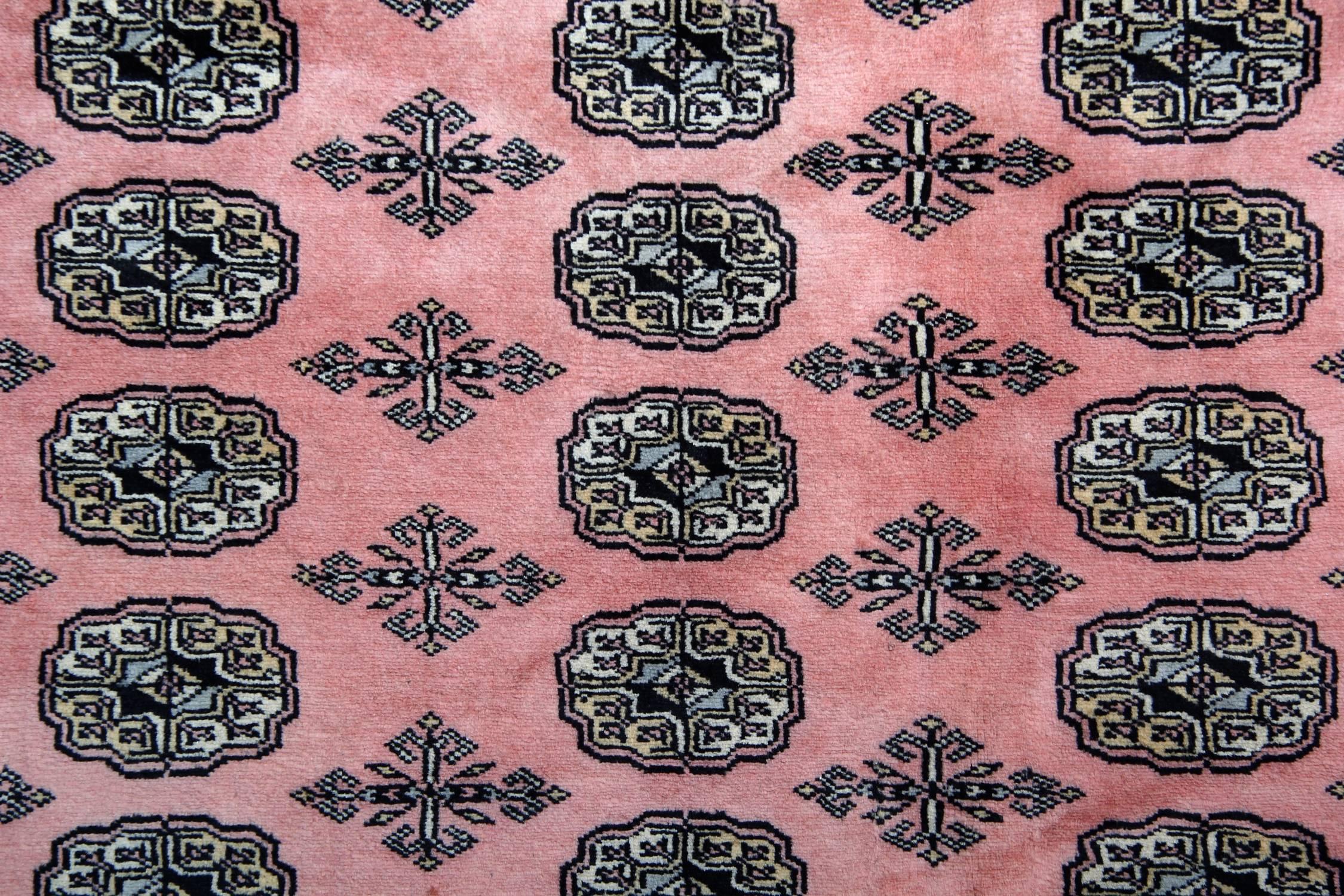 pink bokhara rug