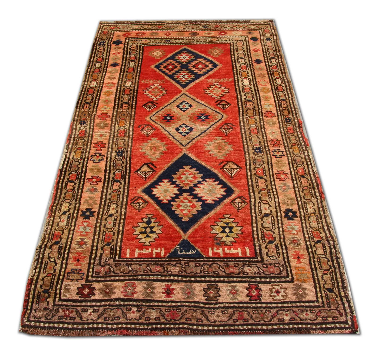 This rug is a vintage rug hand-knotted wide and long gallery runner from Caucasia. It has a geometric rug tribal design made with the wool pile and wool foundation. It can be a very good idea as a living room rug or dining room rug in home