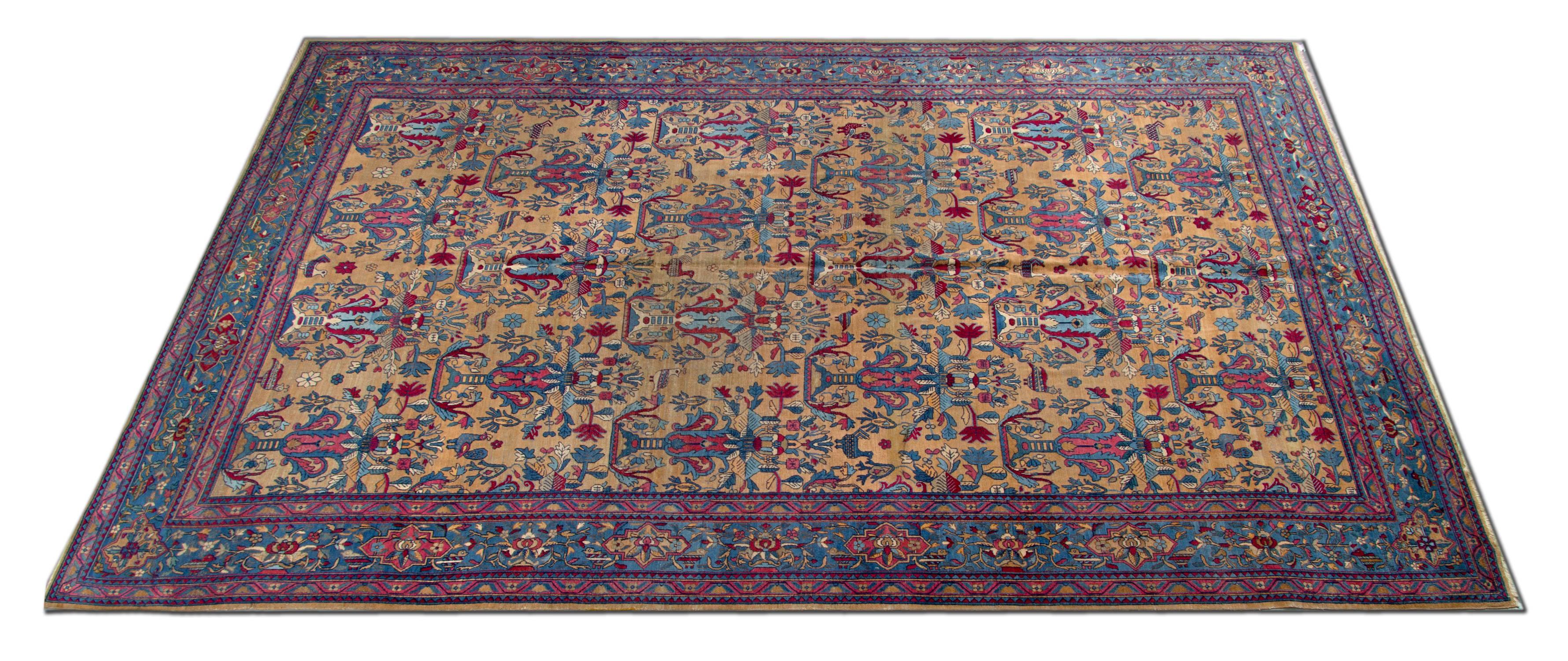 An antique Persian carpet from Tehran, circa 1880. These lovely handmade rugs features a very fine weave and are very rare found in the world. This carpet rug is made with hand-knotted wool and cotton. This gold rug has a short pile and a beautiful