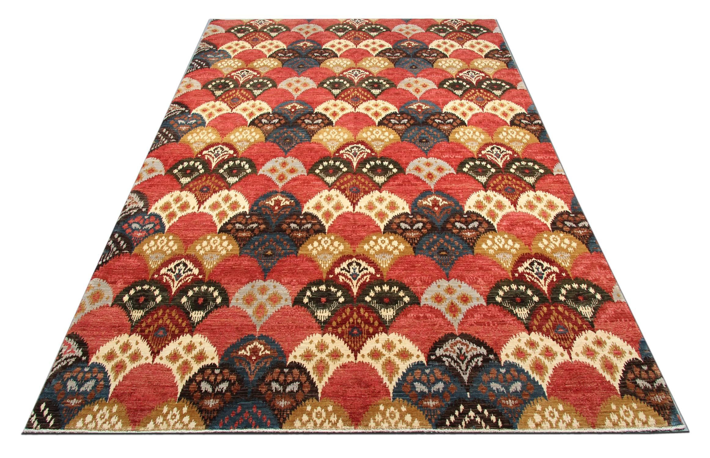 Oriental rug with rich colours and abstract elements, these modern Afghan rugs give a subtle contemporary appearance. These patterned rugs feature a beautiful rust palette. This modern carpet consist of blue, gold and grey colours. These large area