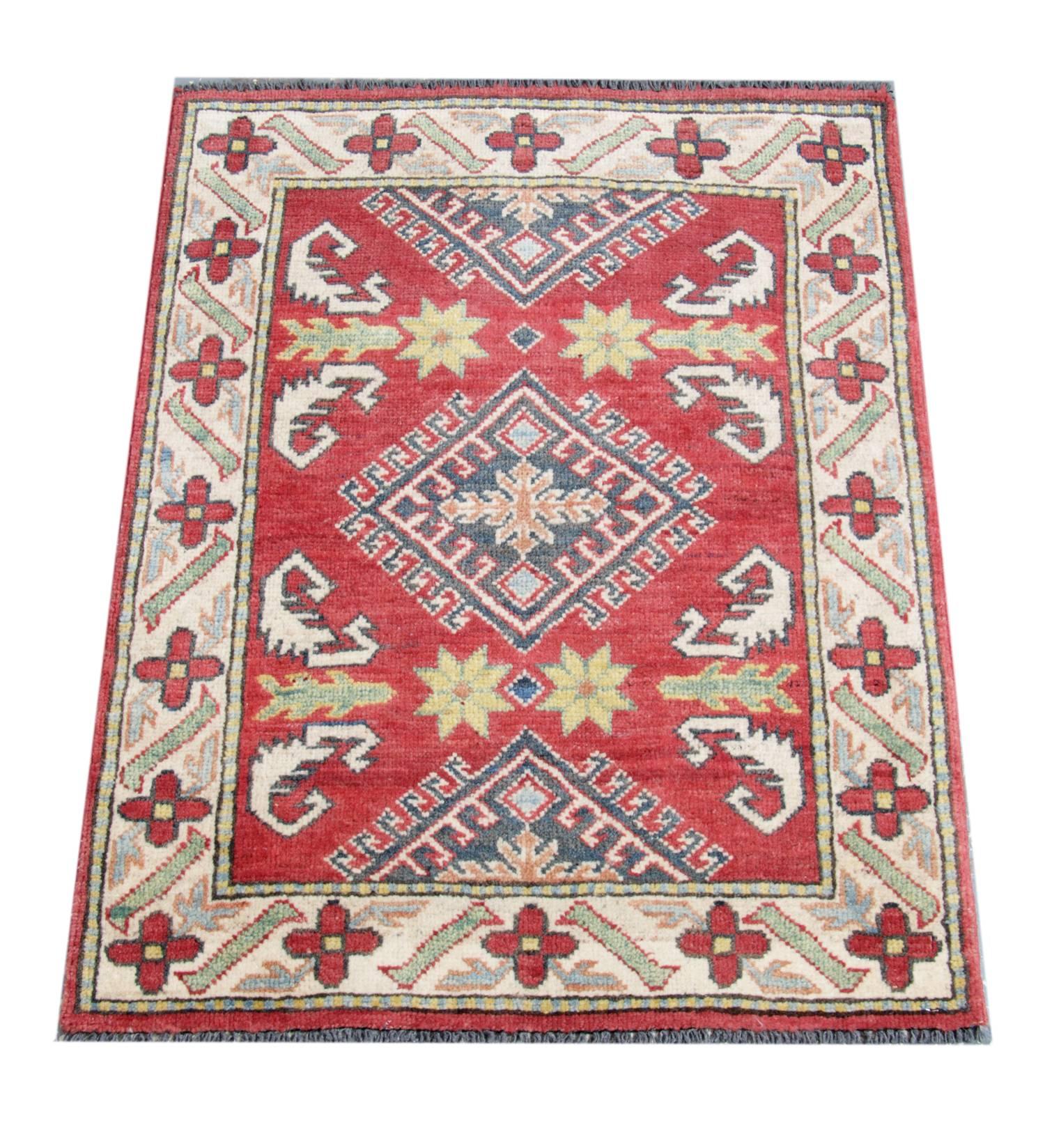 This new traditional handwoven rug is featuring designs from the Kazak region. Traditional rugs are making the region of Afghanistan. This floral rug has been made by Afghan weavers of top quality wool and cotton.  This oriental rug there are