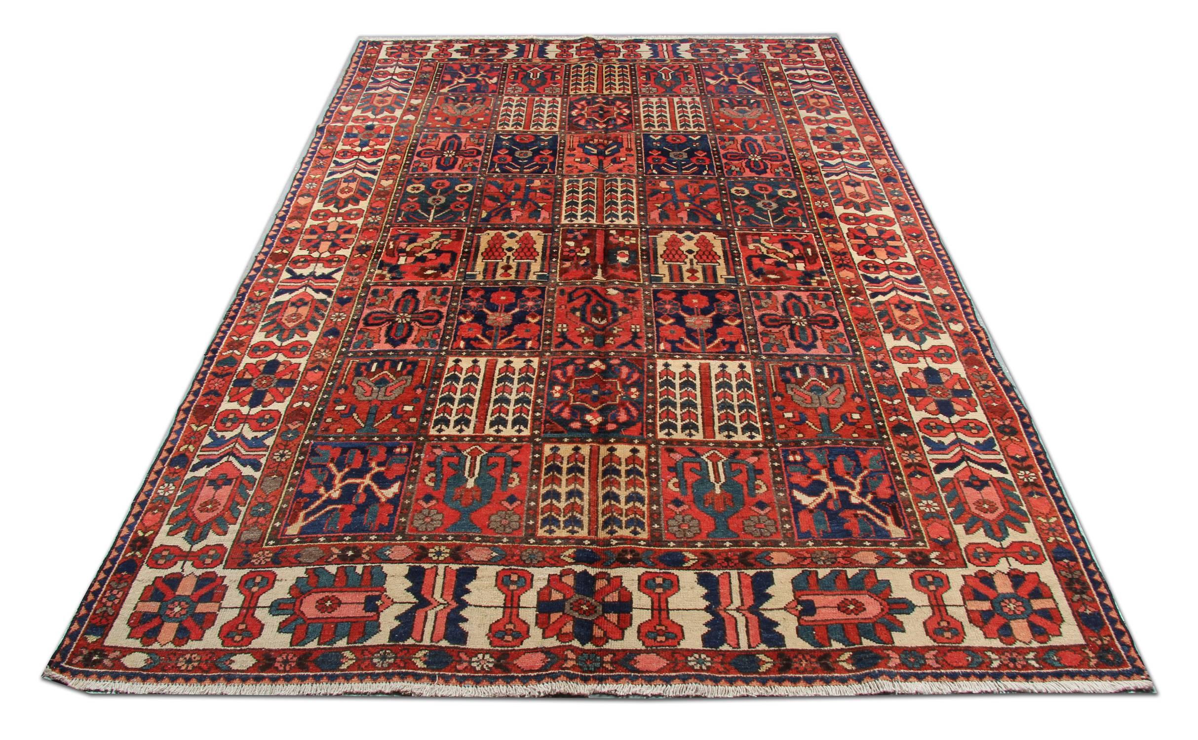 Vintage Persian Lori woven rug with the exquisite garden Persian rug designs and well over 60 years old. This floral rug was made in western Persia with Lori tribes. This tribal rug was also made with hand spun wool and using only organic dyes. This