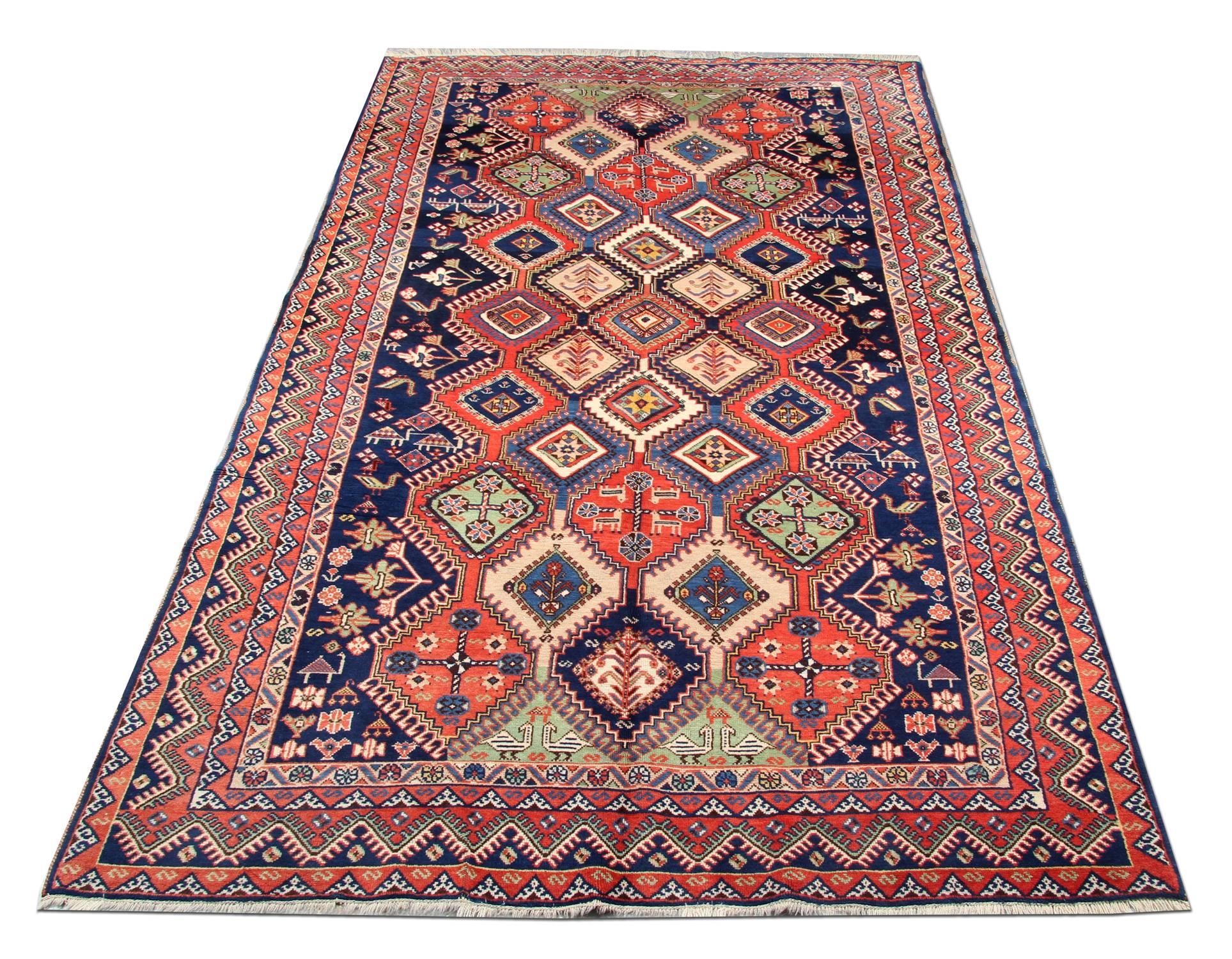 Are you looking for an antique rug to enhance your bedroom or living room? This beautiful wool rug is sure to make the perfect accent rug. The design has been woven by hand and features a bold geometric pattern woven in accents of blue, red and