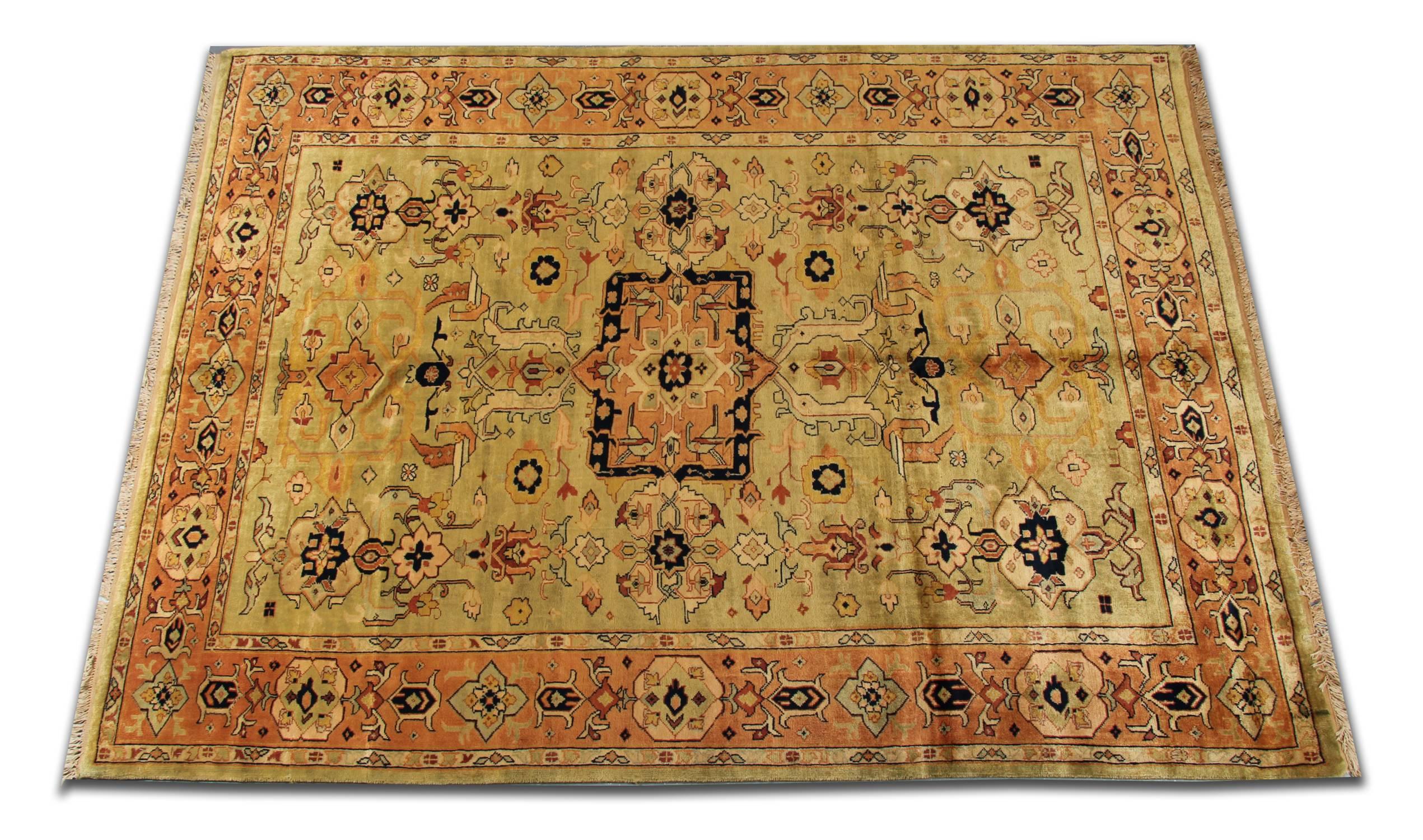 This grand wool rug has been woven by hand and features a symmetrical floral motif and medallion design. Made with a creamy beige background with accents of brown, rust and black accents that make up the intricate design.
Suitable for both modern