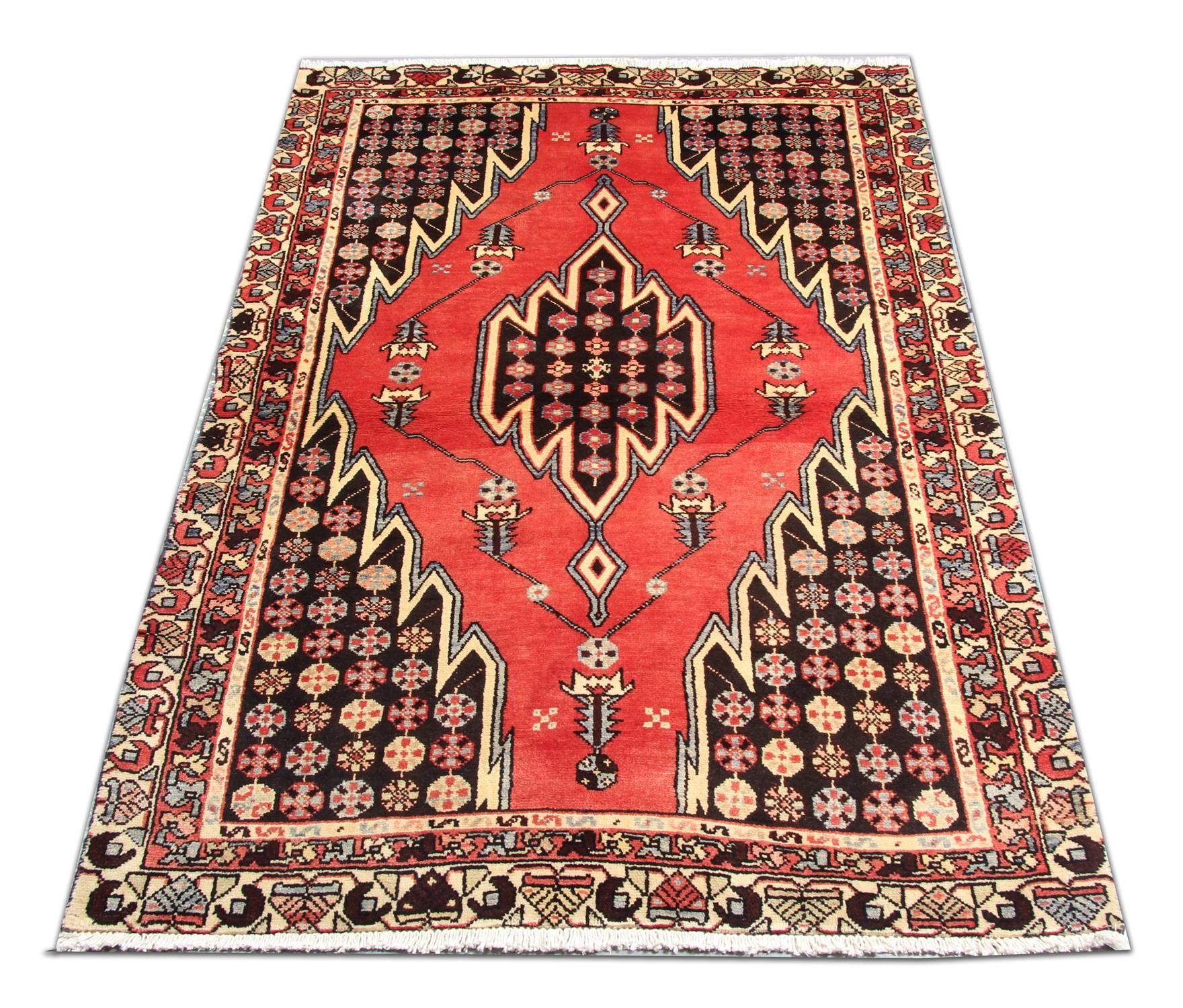 Upgrade your floors with this beautiful handwoven wool rug. Featuring a fantastic central medallion design woven on a red field and a highly-detailed surround design and border. This rug would make a perfect addition to any home. Suitable for both
